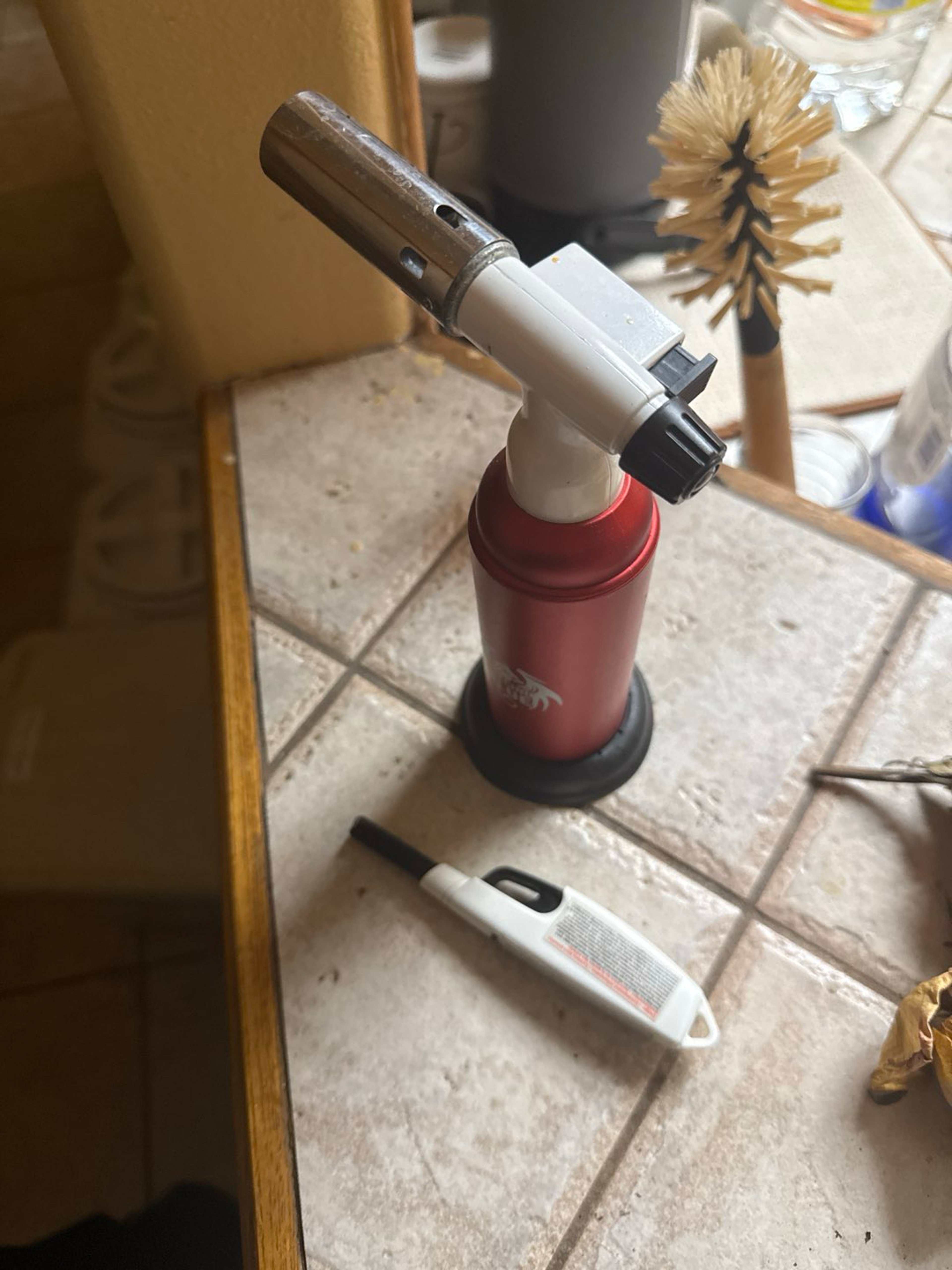 Preview pic of 2 lighters, one red blowtorch one white lighter