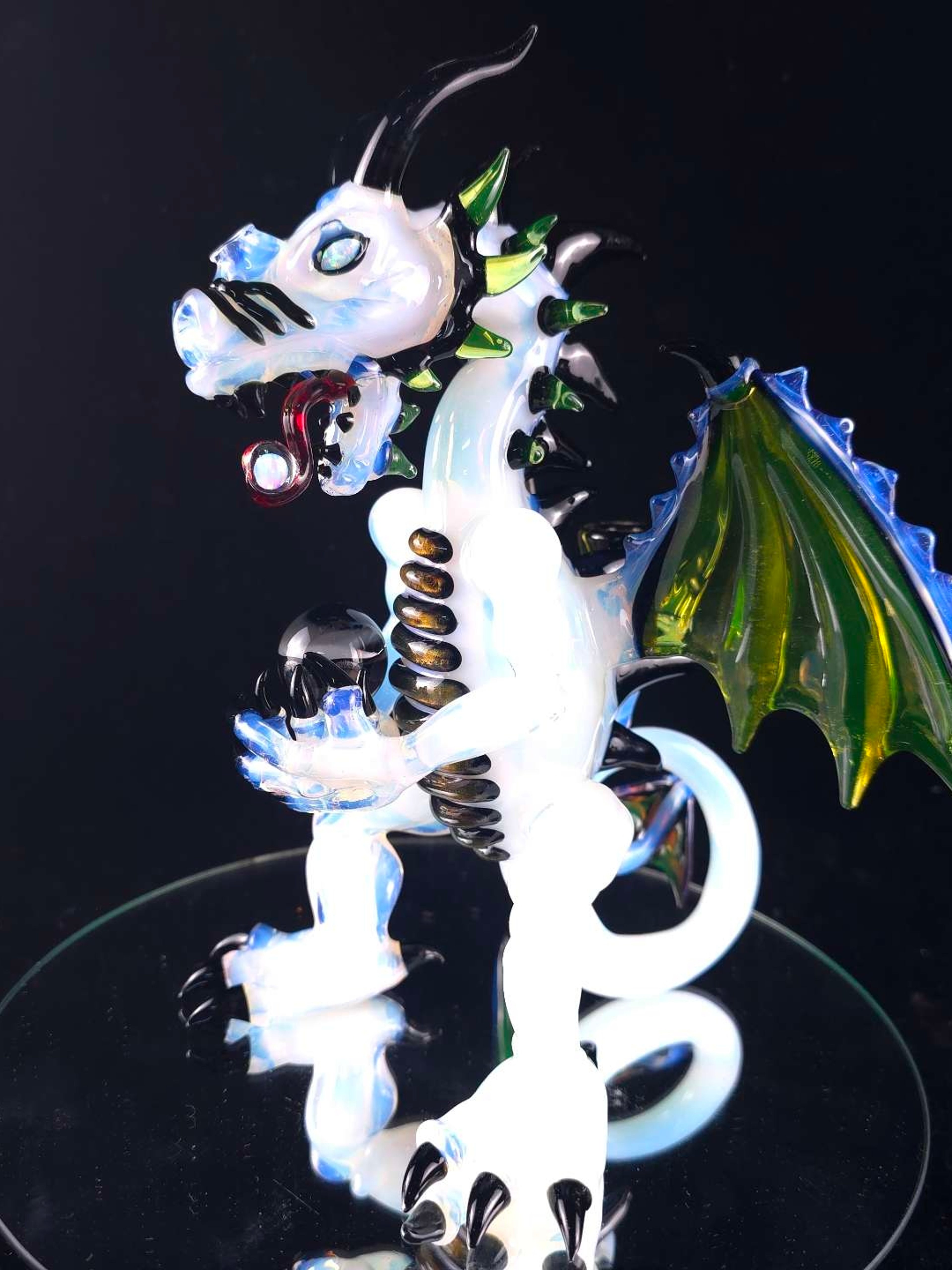 Opal eating dragon sculpture image 0