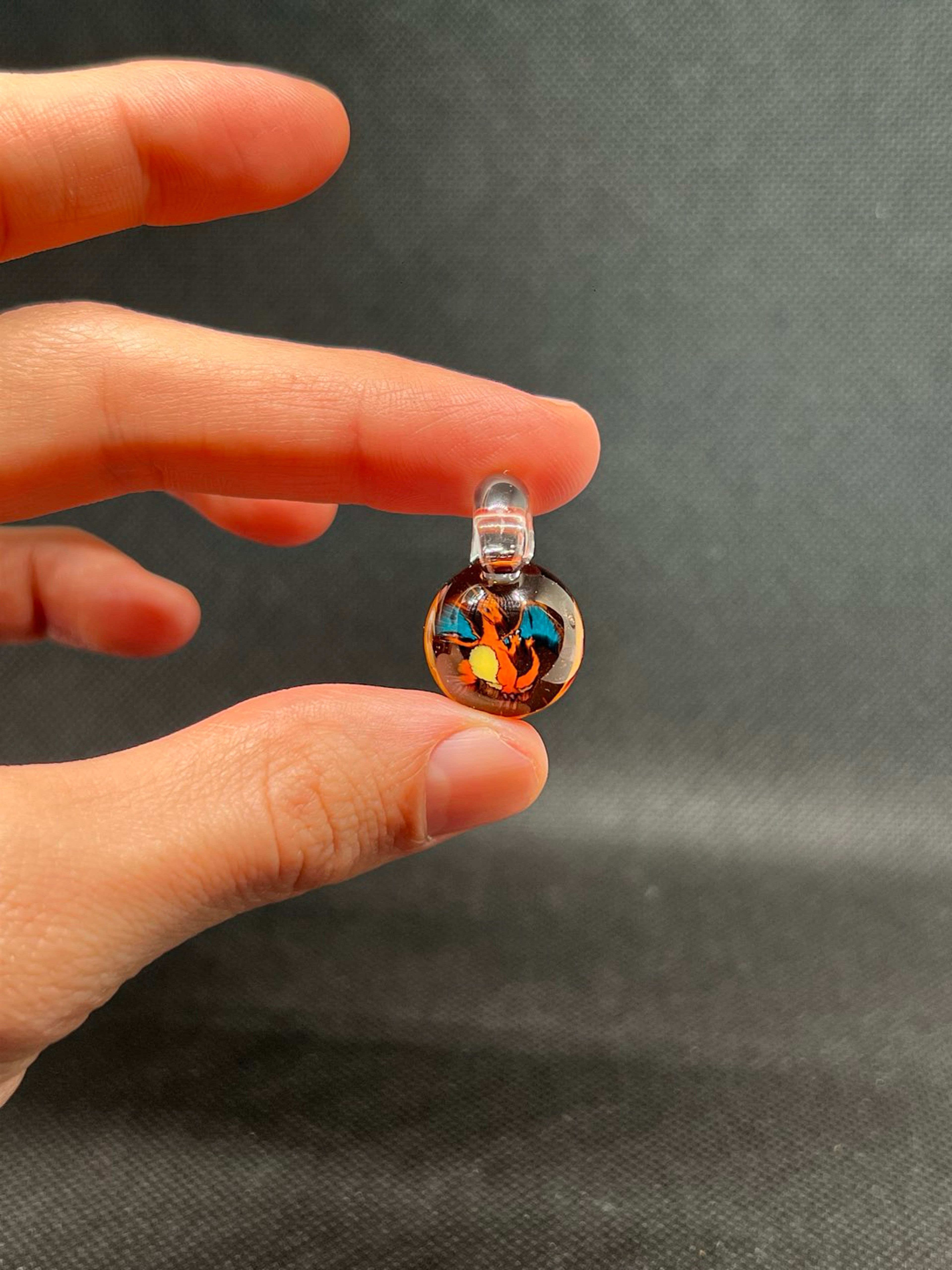 Charizard mille pendant image 0