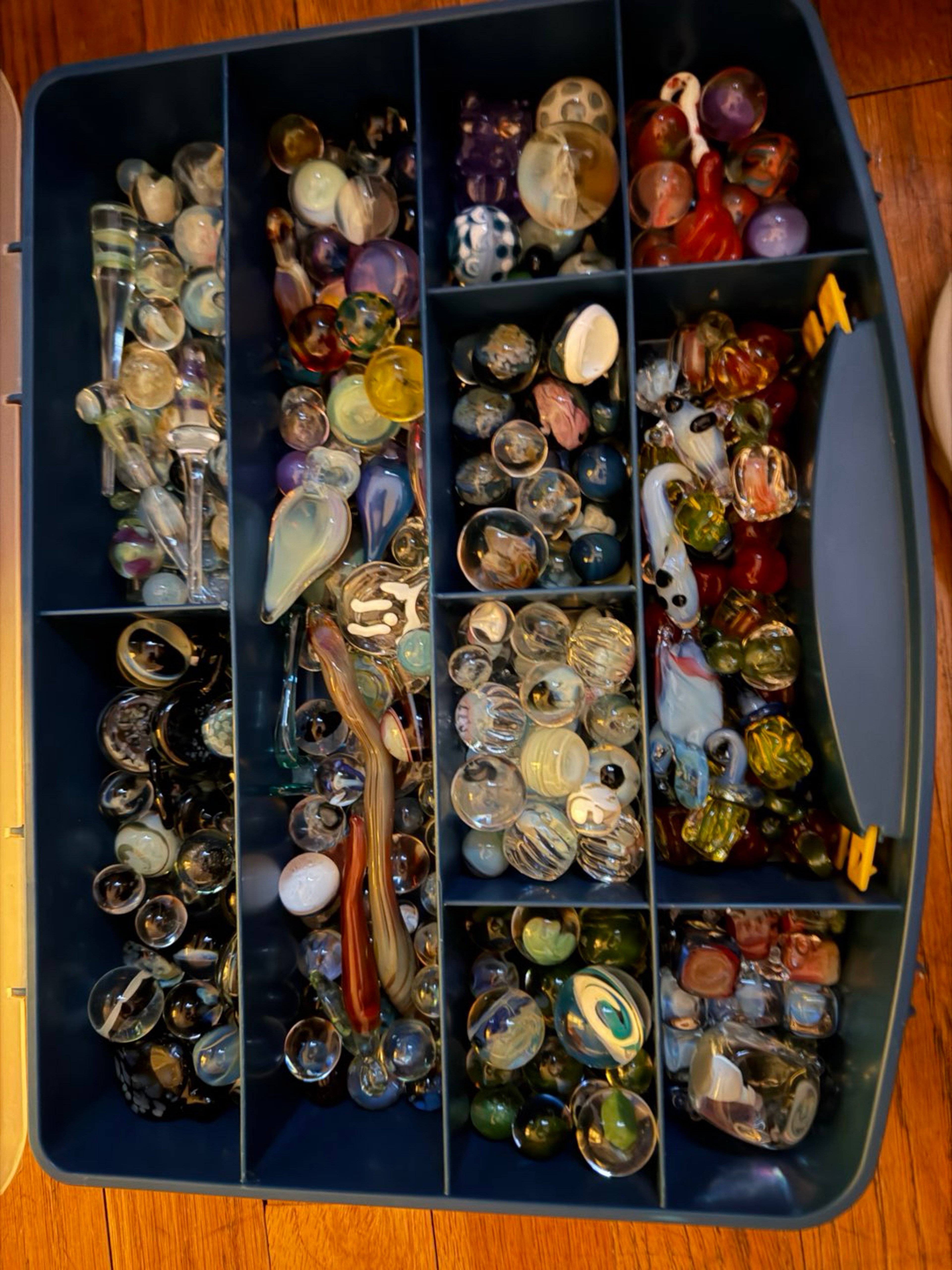 Assorted marbles and pendants image 0