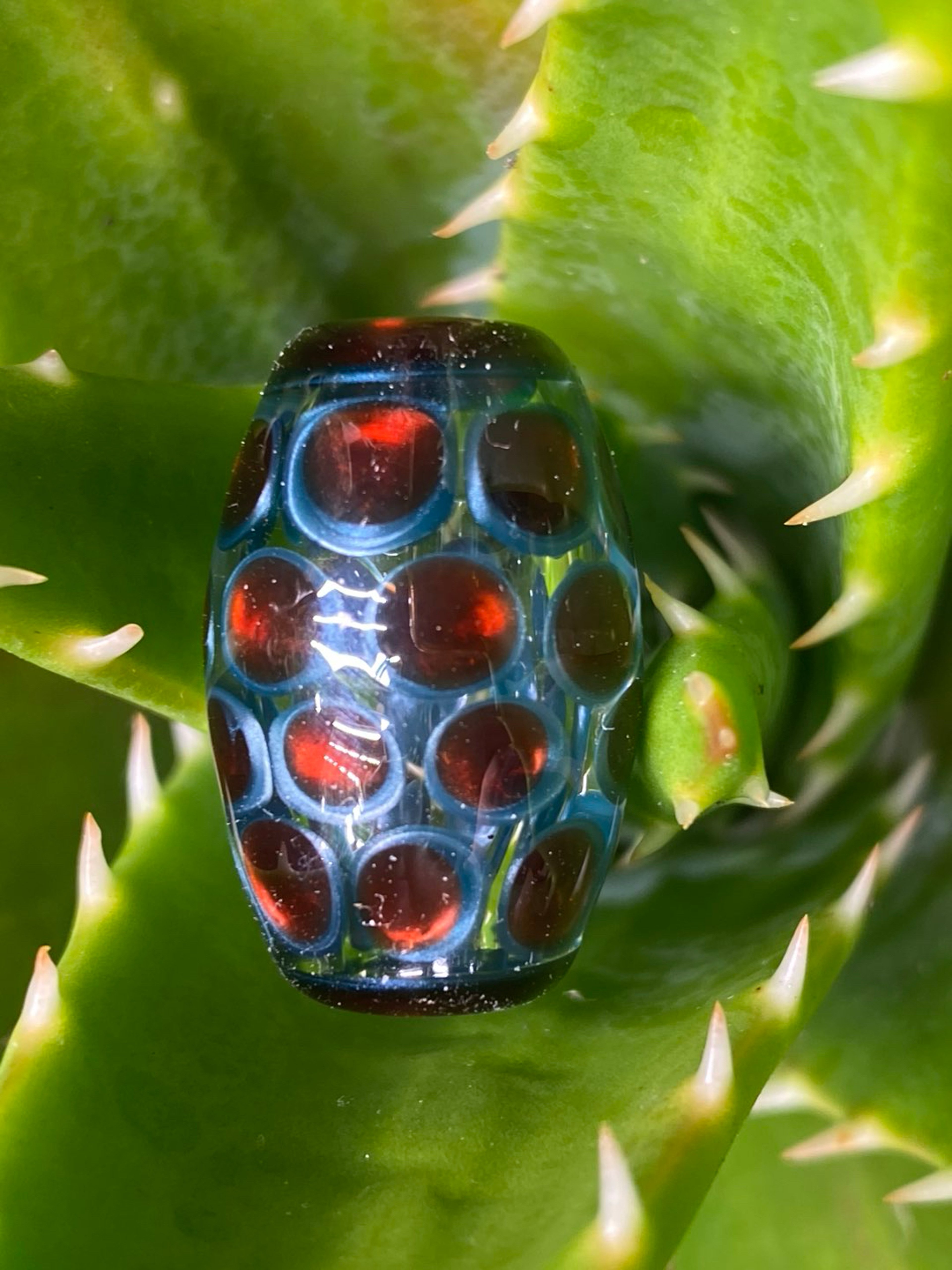 Ruby and neptunium bead image 0