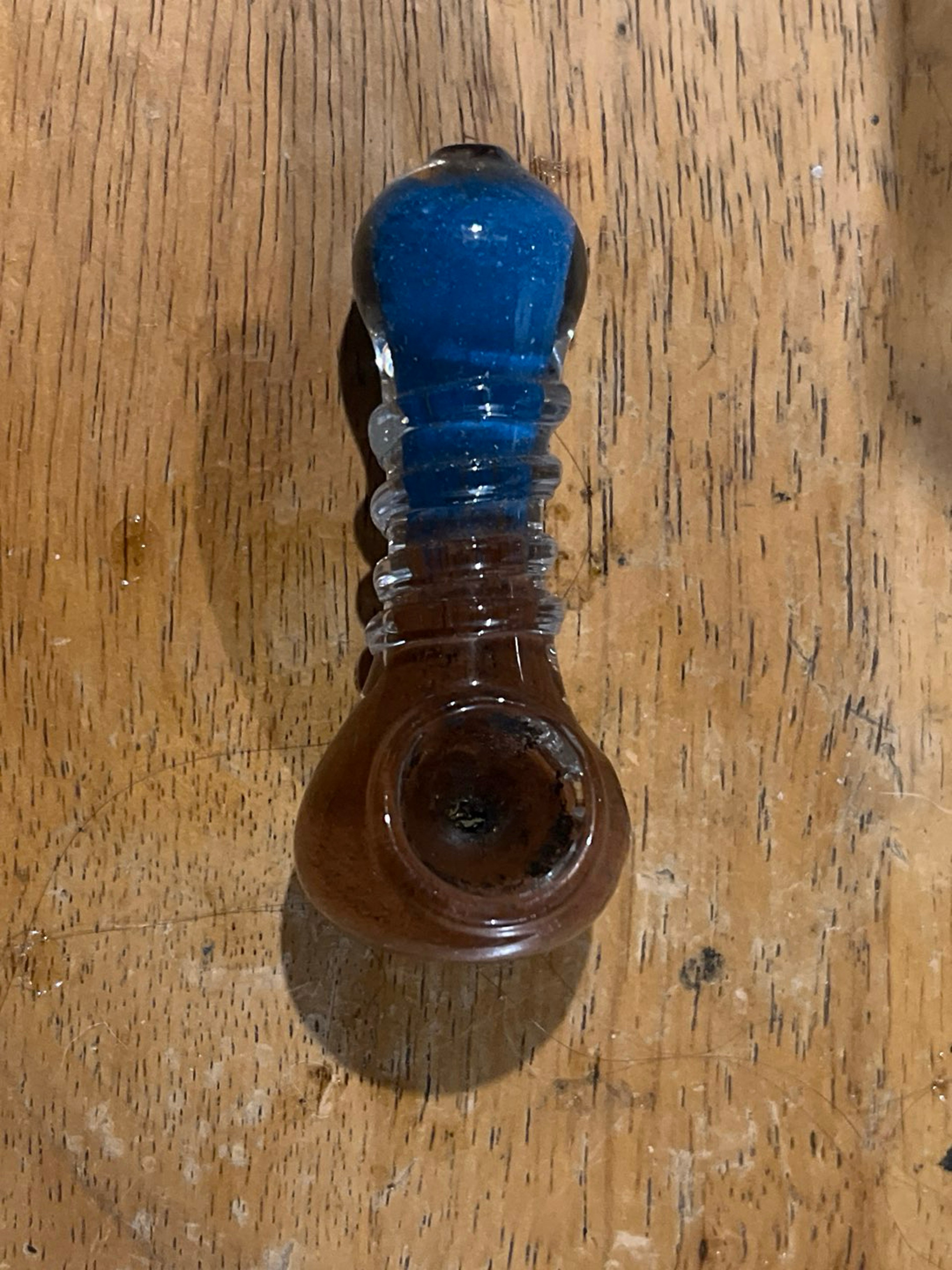 Preview pic of Brown and blue spoon pipe