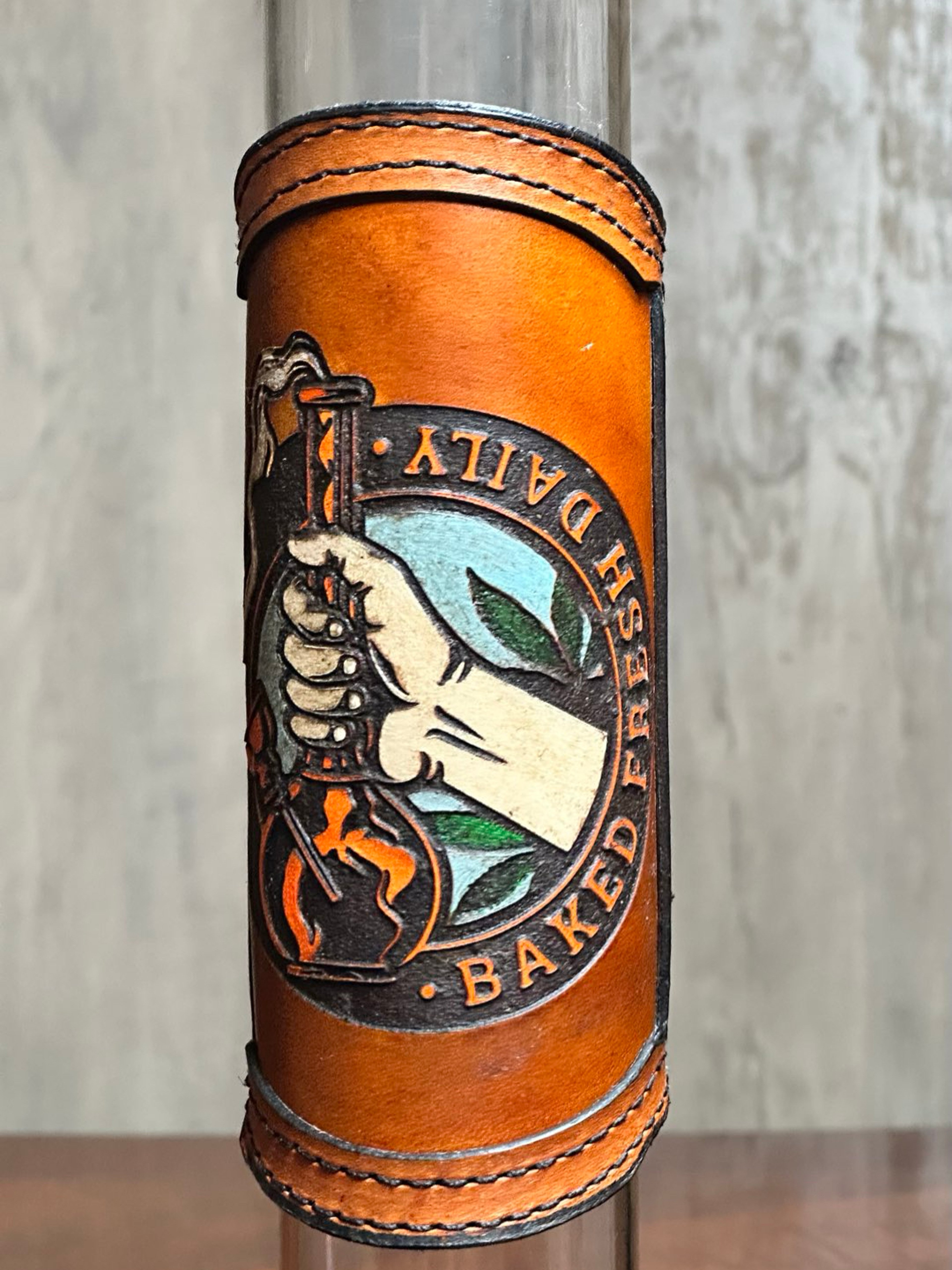 Preview pic of RipGrip – Handcrafted Leather Wrap with Neon Accents for Glass Pieces