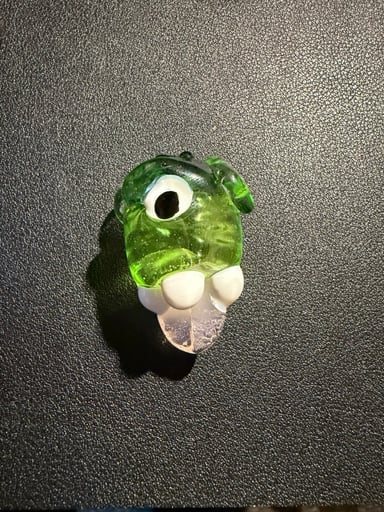 Preview pic of Tattoo face creature pendy