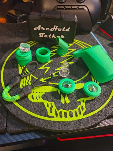 Preview pic of Puffco travel pack with tether and extras