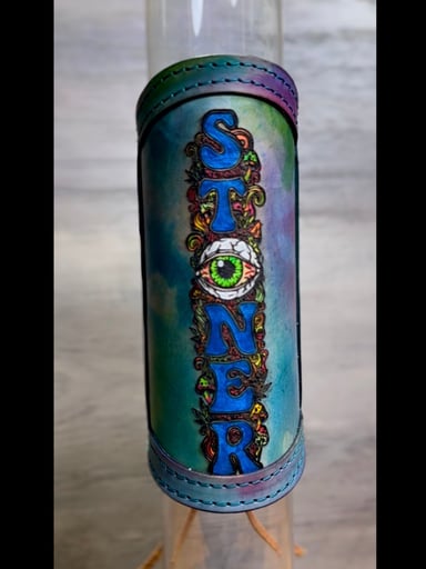 Preview pic of RipGrip 2-in-1 Glow – Hand-Painted Leather Wrap for Glass Piece (UV Reactive + Daylight Pop, Fits Most 12-15” Necks)