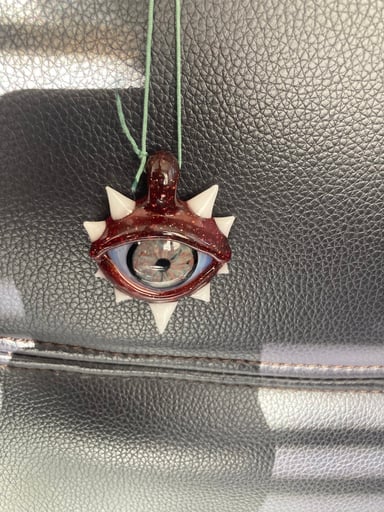 Preview pic of Spikey eye pendant