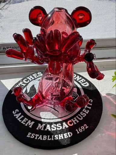 Preview pic of Casto: Red Sitting Doll