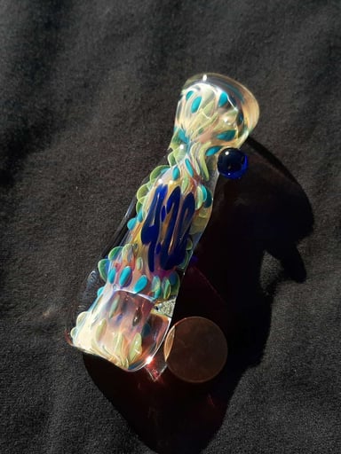 Preview pic of 420, inside out, color changing, borosilicate glass chillum with a flattened mouth