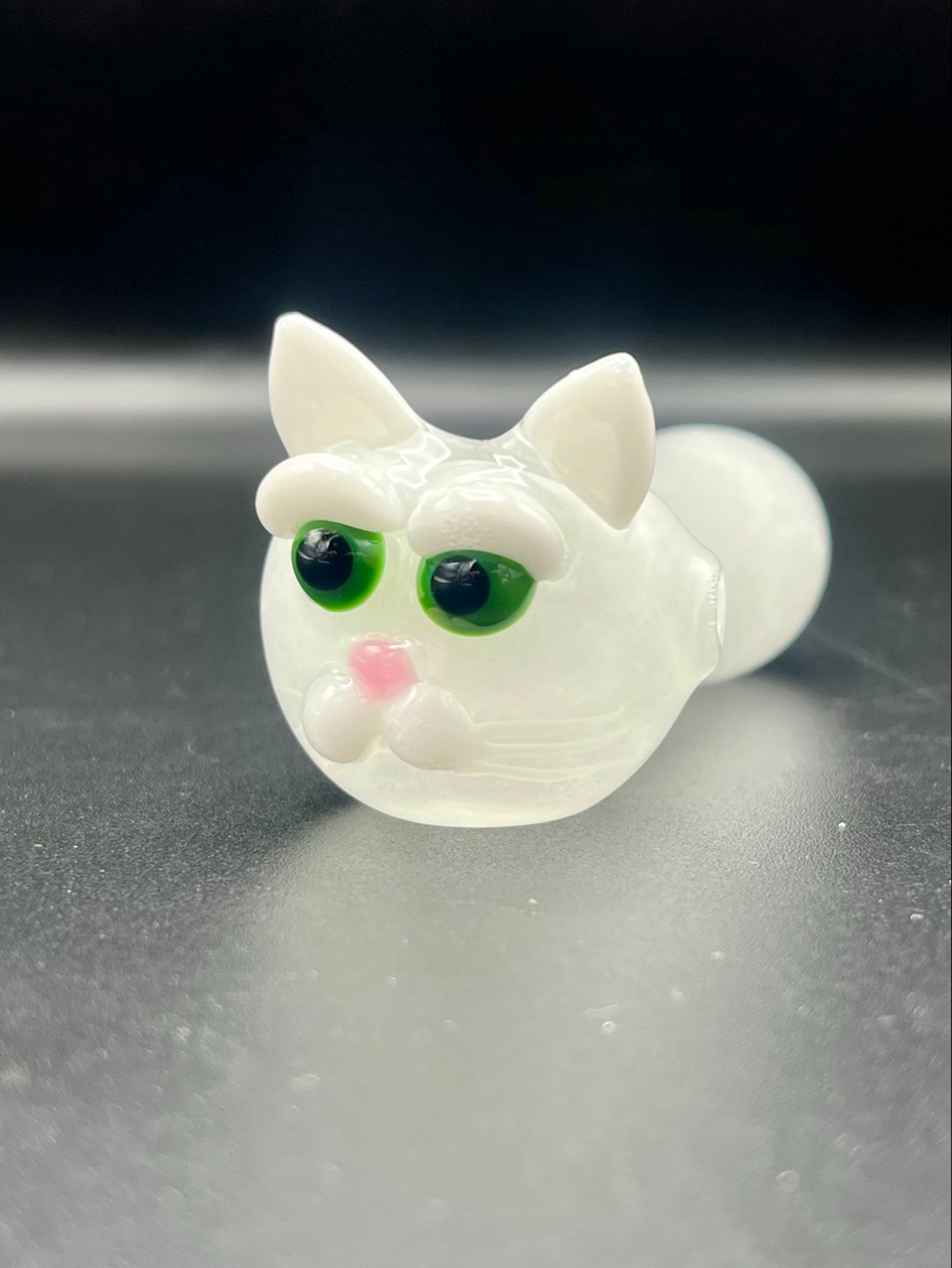 Hand blown sno white cat pipe with jade eyes. image 0