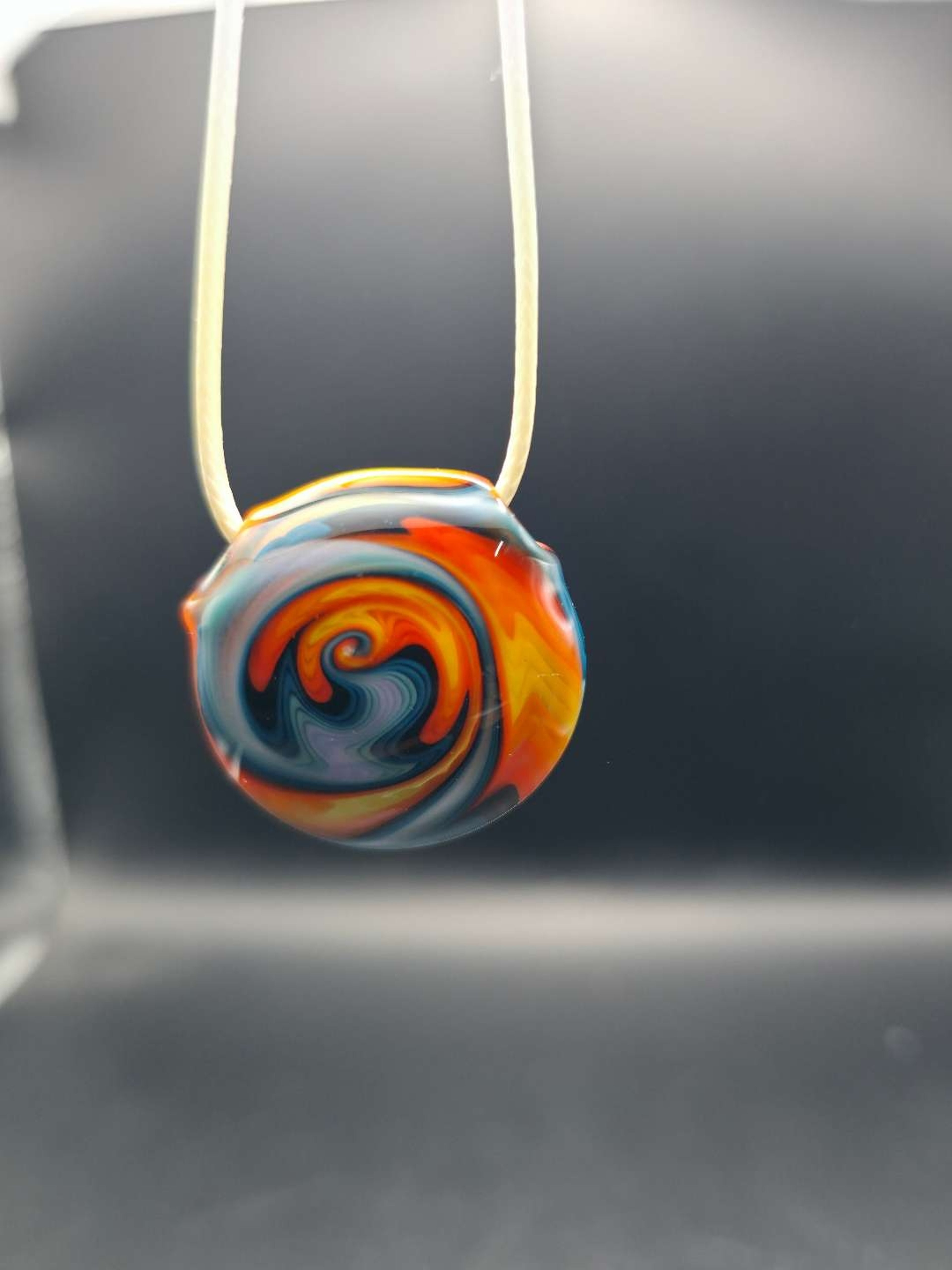 Hollow wig-wag pendant image 0