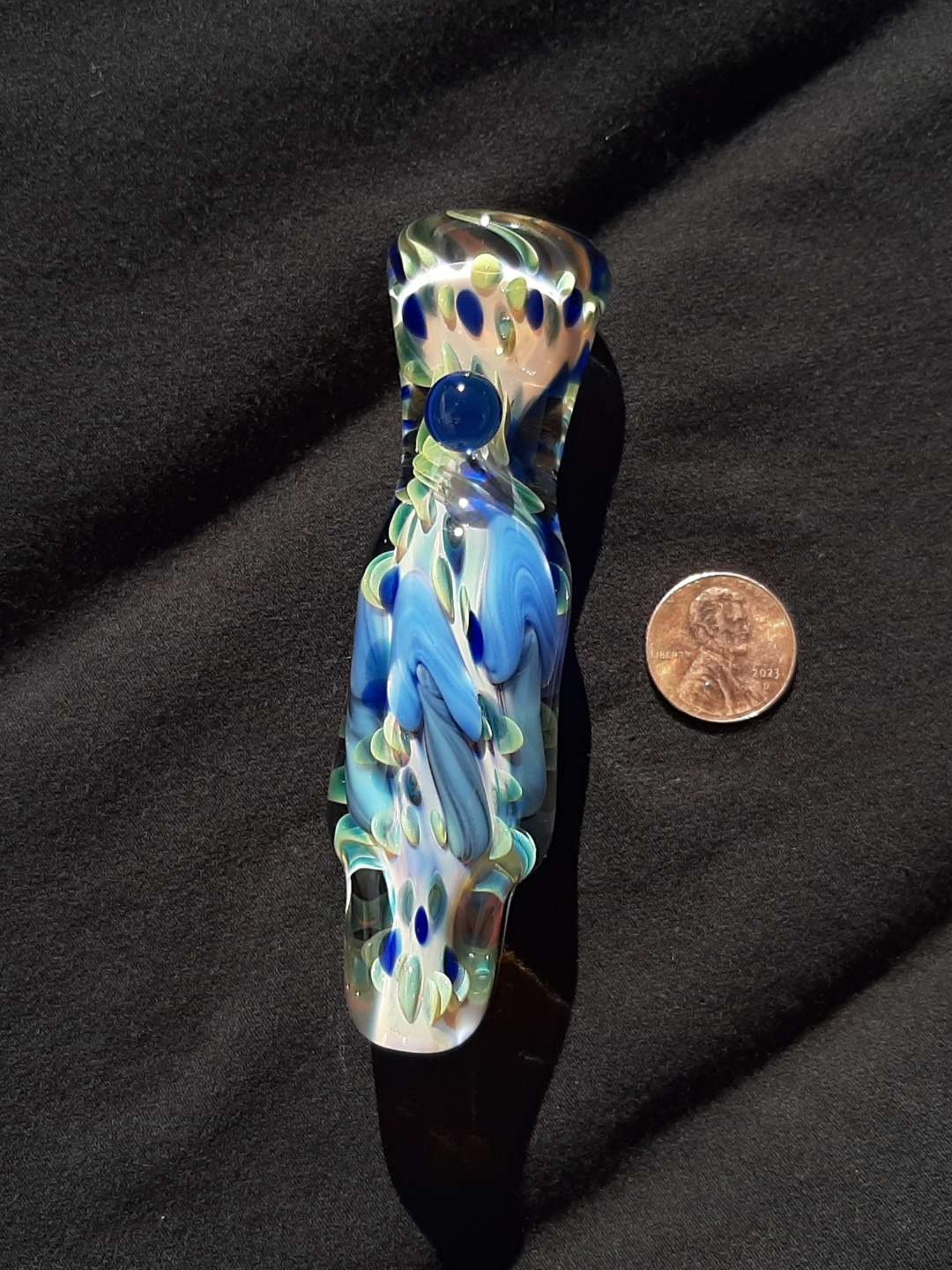 Preview pic of Inside out, color changing, borosilicate glass, mushroom chillum with a flattened mouth