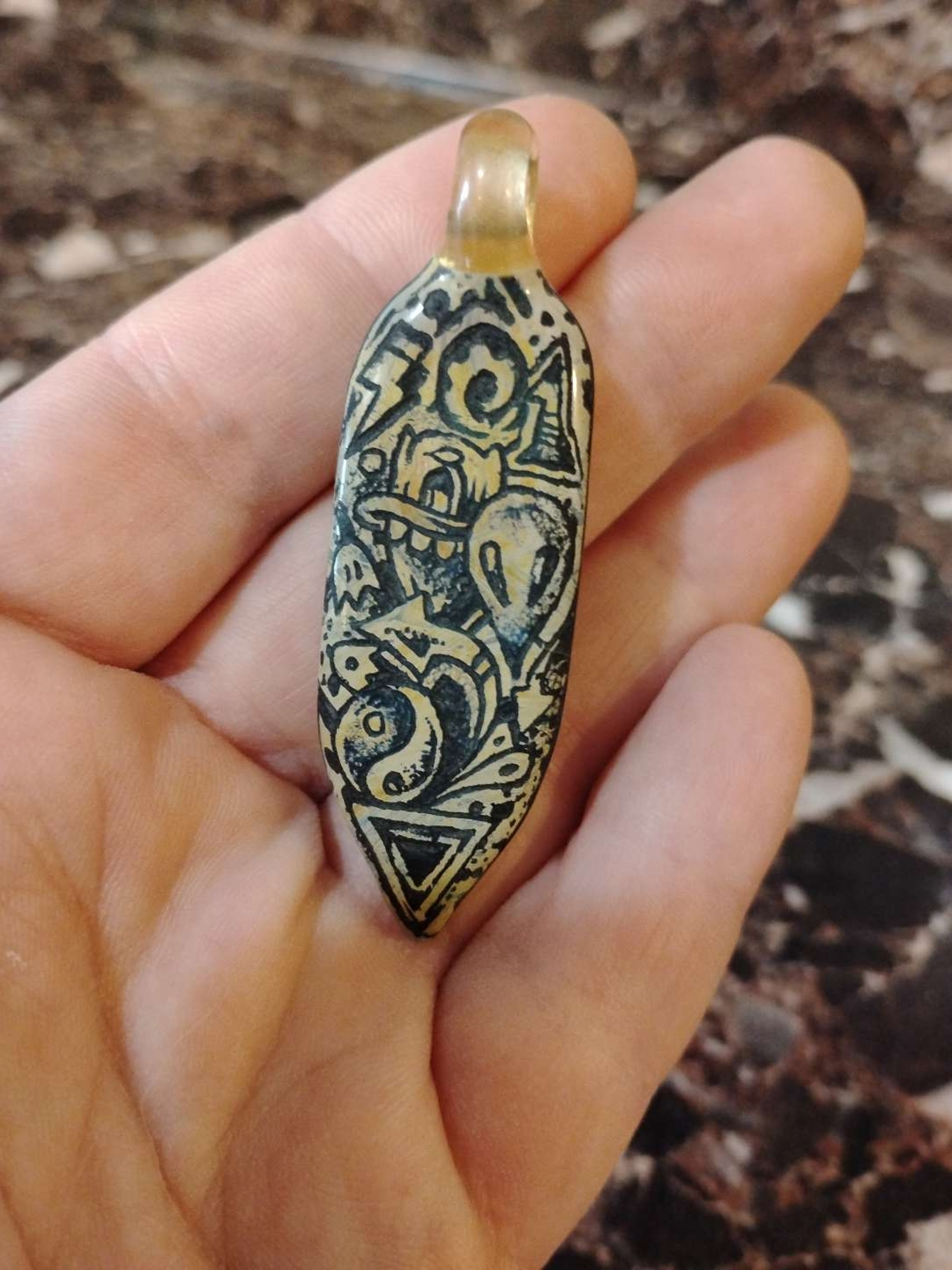 Preview pic of Trevy Metal carved pendant