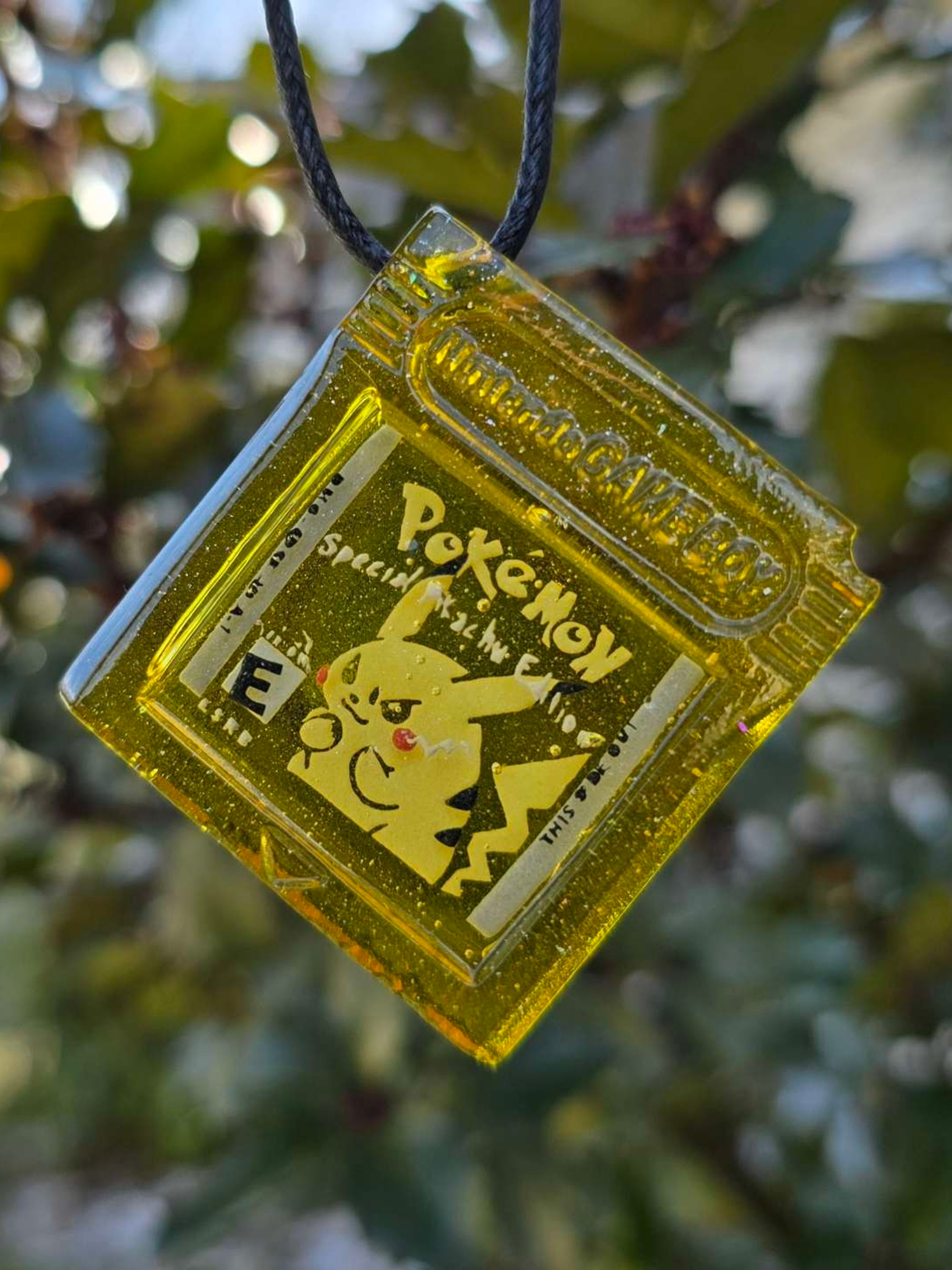 Preview pic of Seconds Pokemon Yellow Pikachu Game Cartridge Pendant