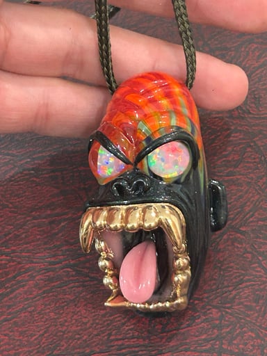 Preview pic of Gold teeth firefly pendant