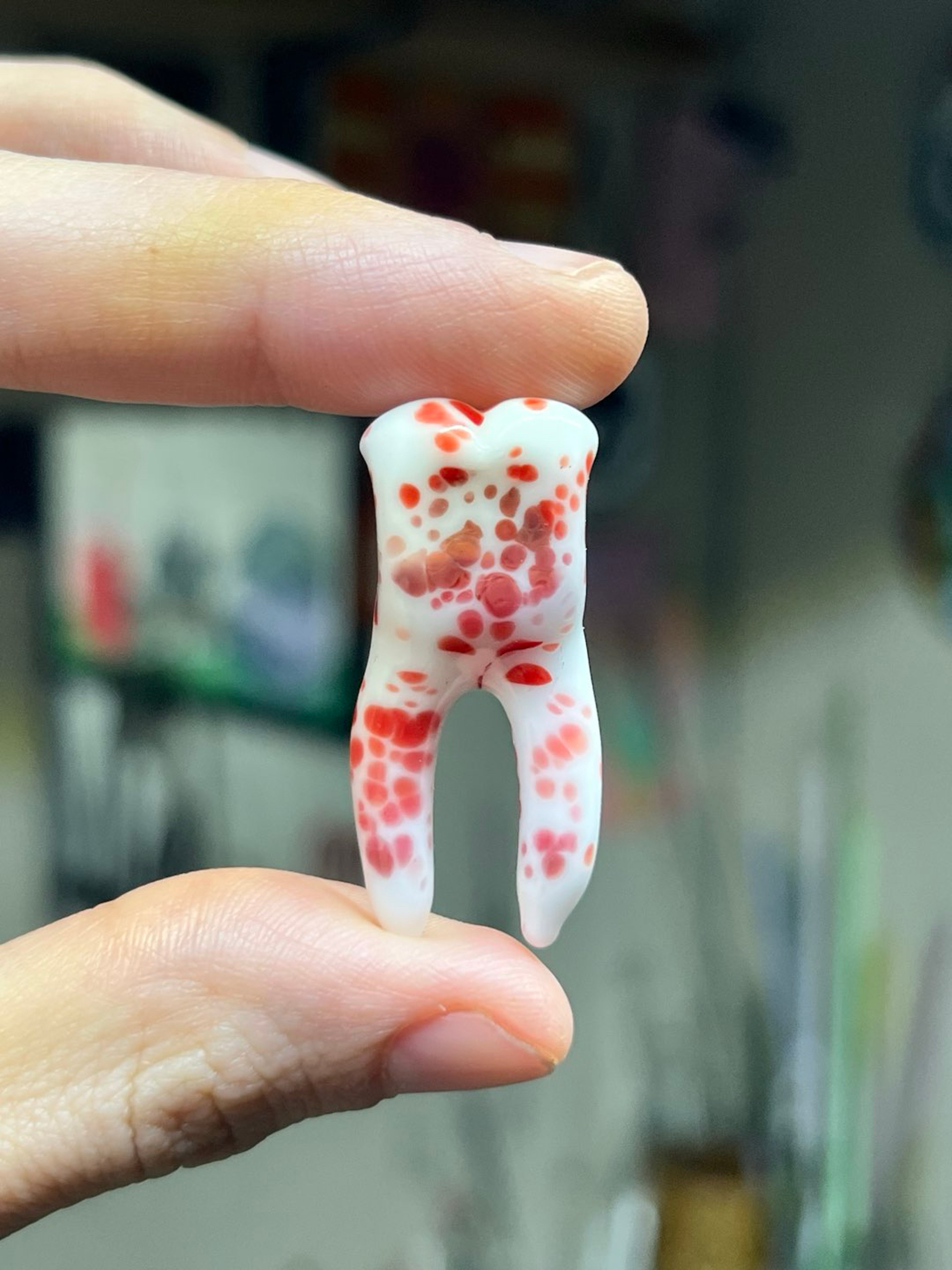 Bloody tooth pendant image 0