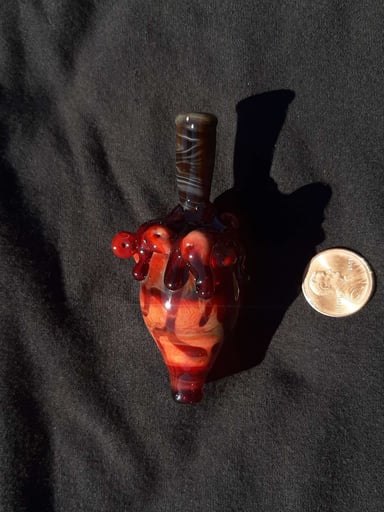 Preview pic of Coiled, bloody heart, borosilicate carb cap with a wood grain stake for a handle. FREE SHIPPING