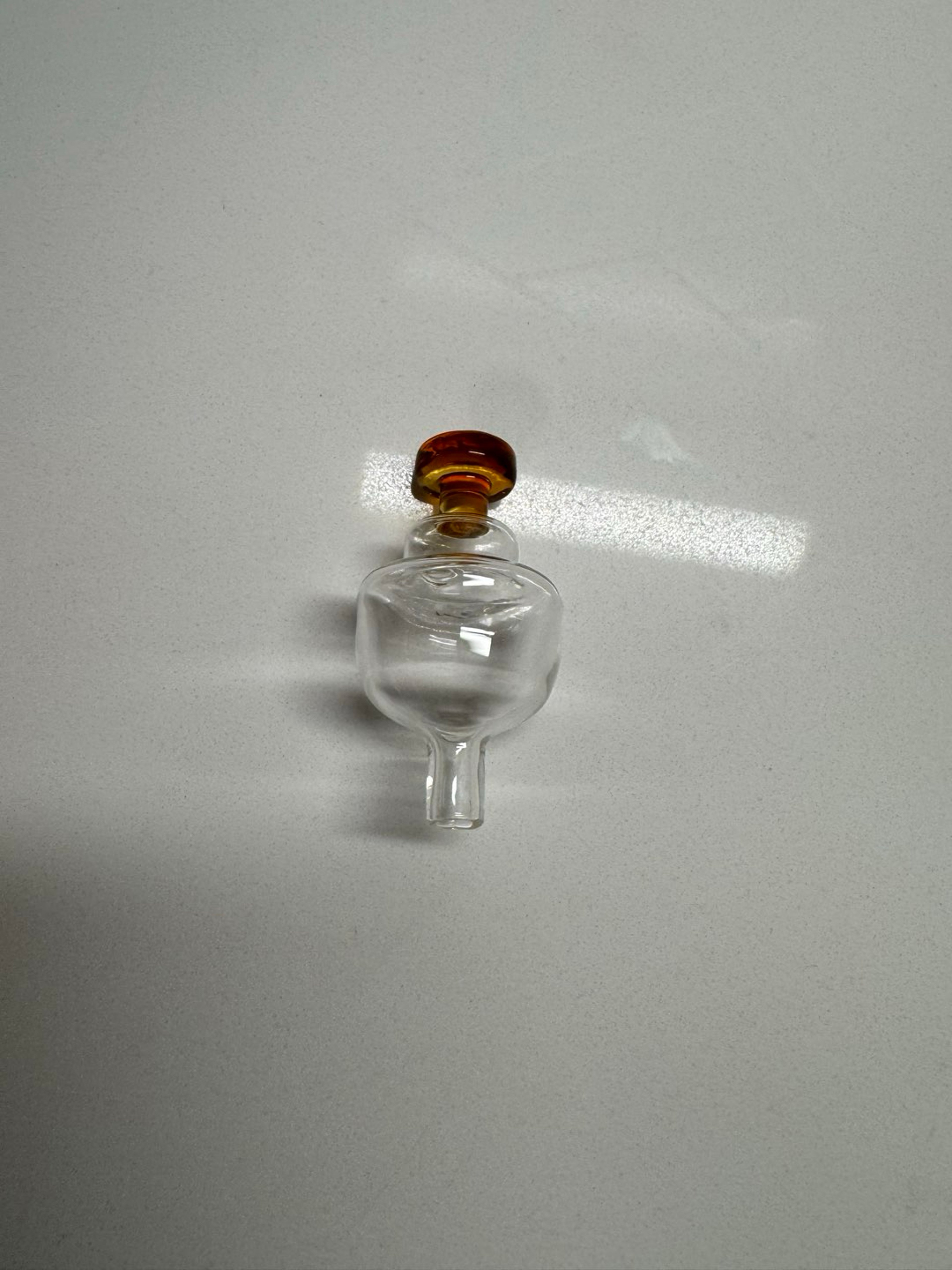 Preview pic of Clear directional carb cap with yellow/gold accents