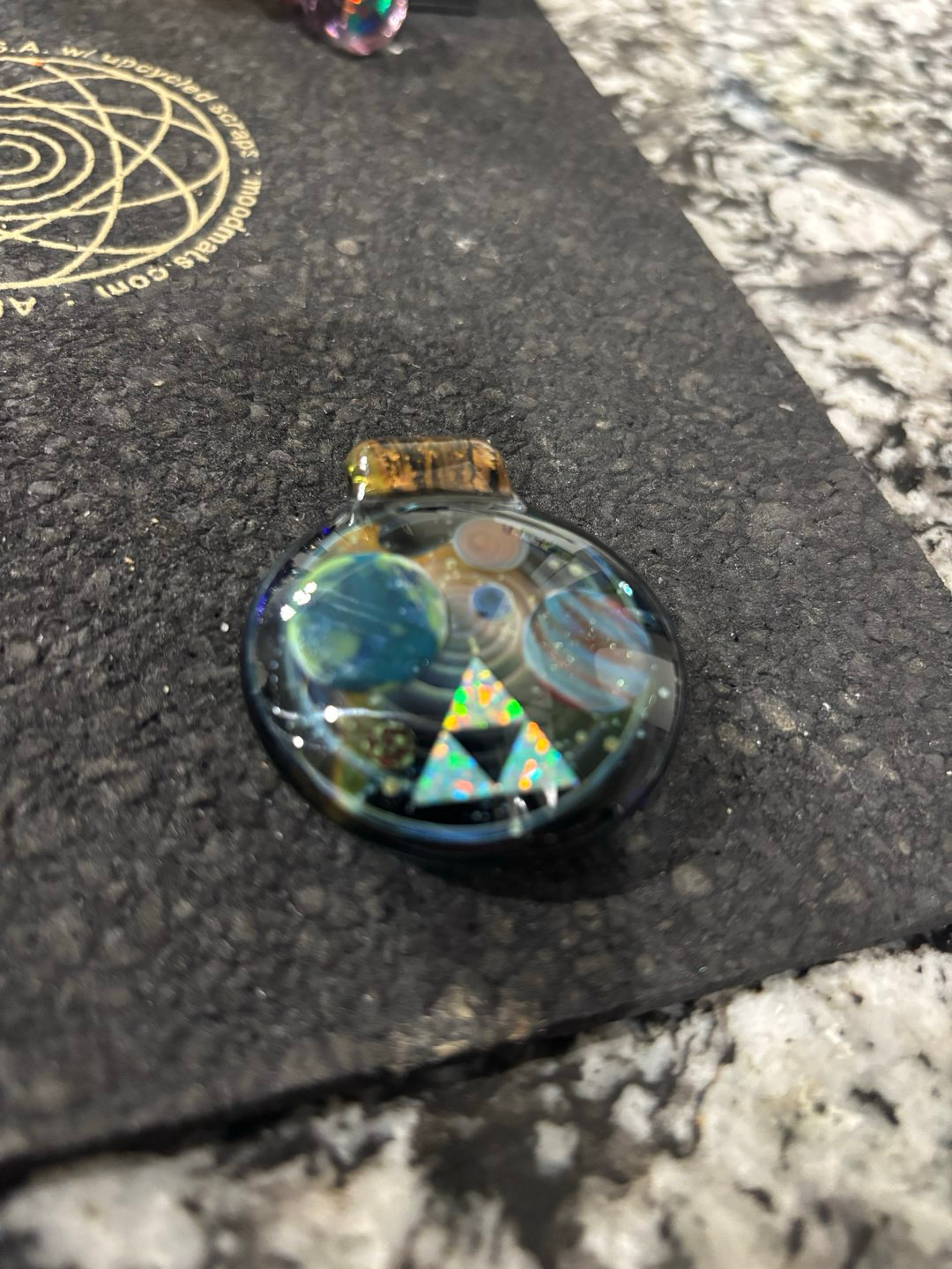 Preview pic of Jolex tri-force space pendant