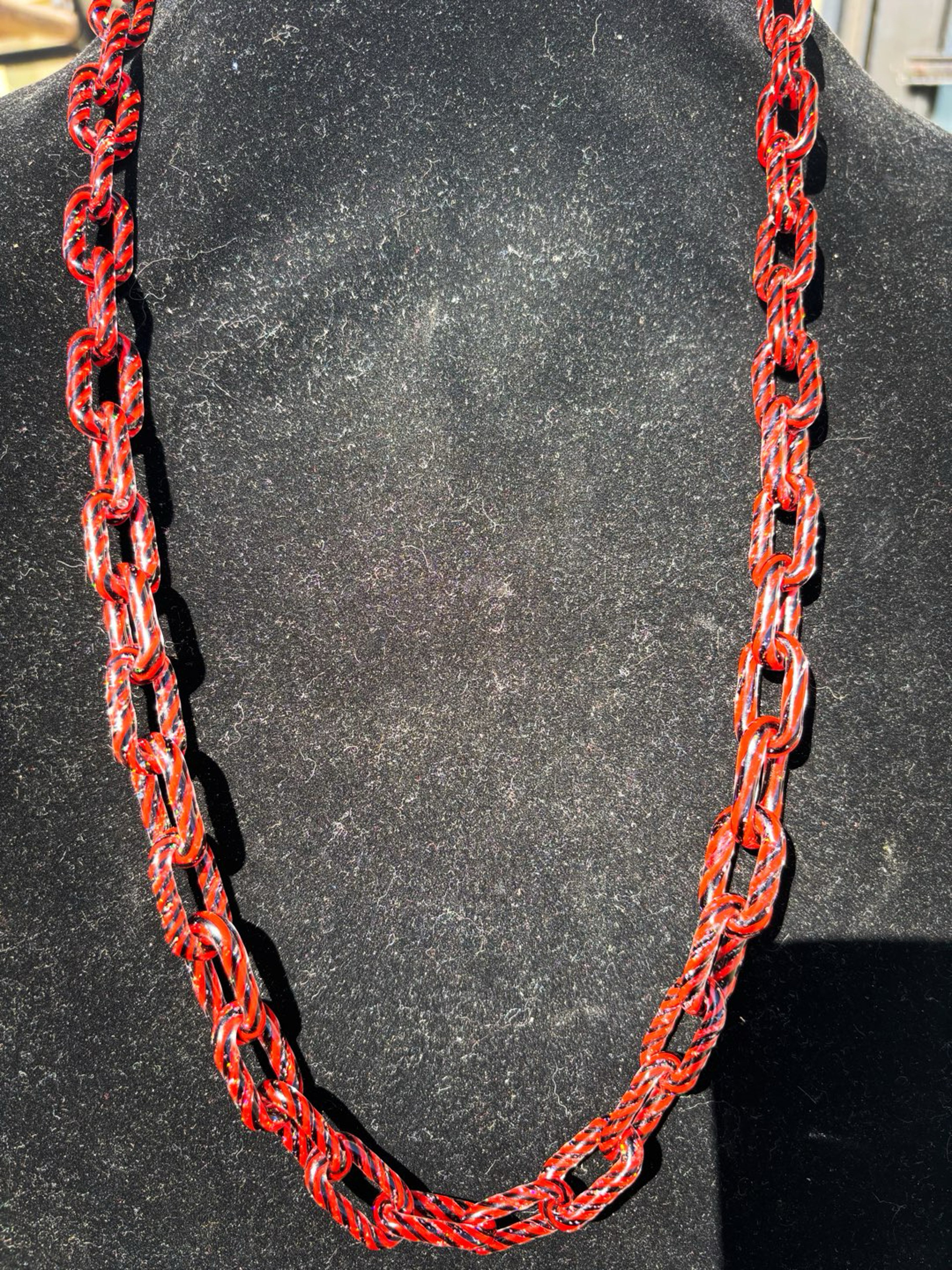 Preview pic of Crushed opal over red and black twisted chain
