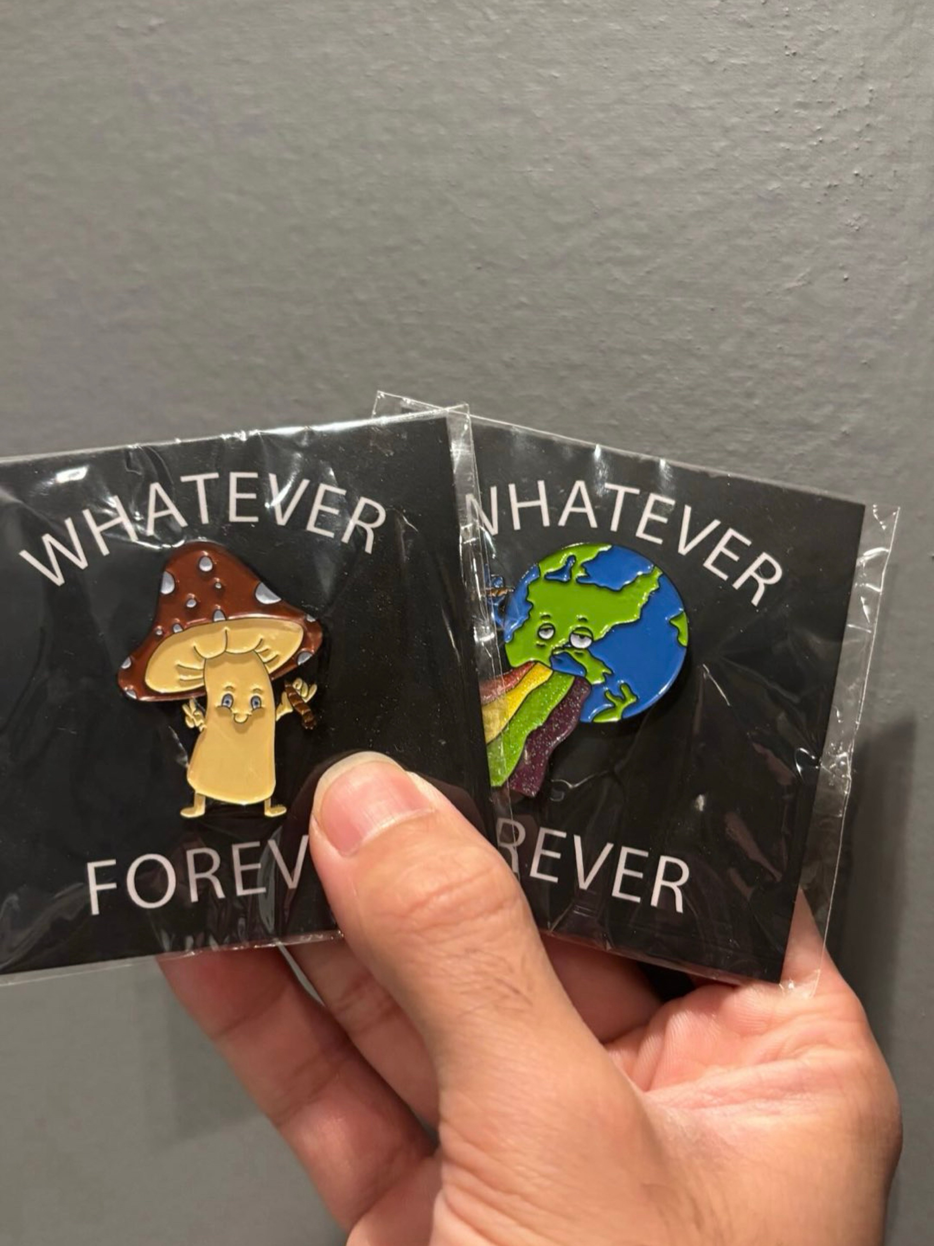 Preview pic of GZ1 enamel Pins puking earth and fun guy
