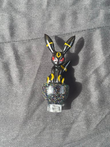 Preview pic of Saiyan Glass Umbreon Spinner Cap