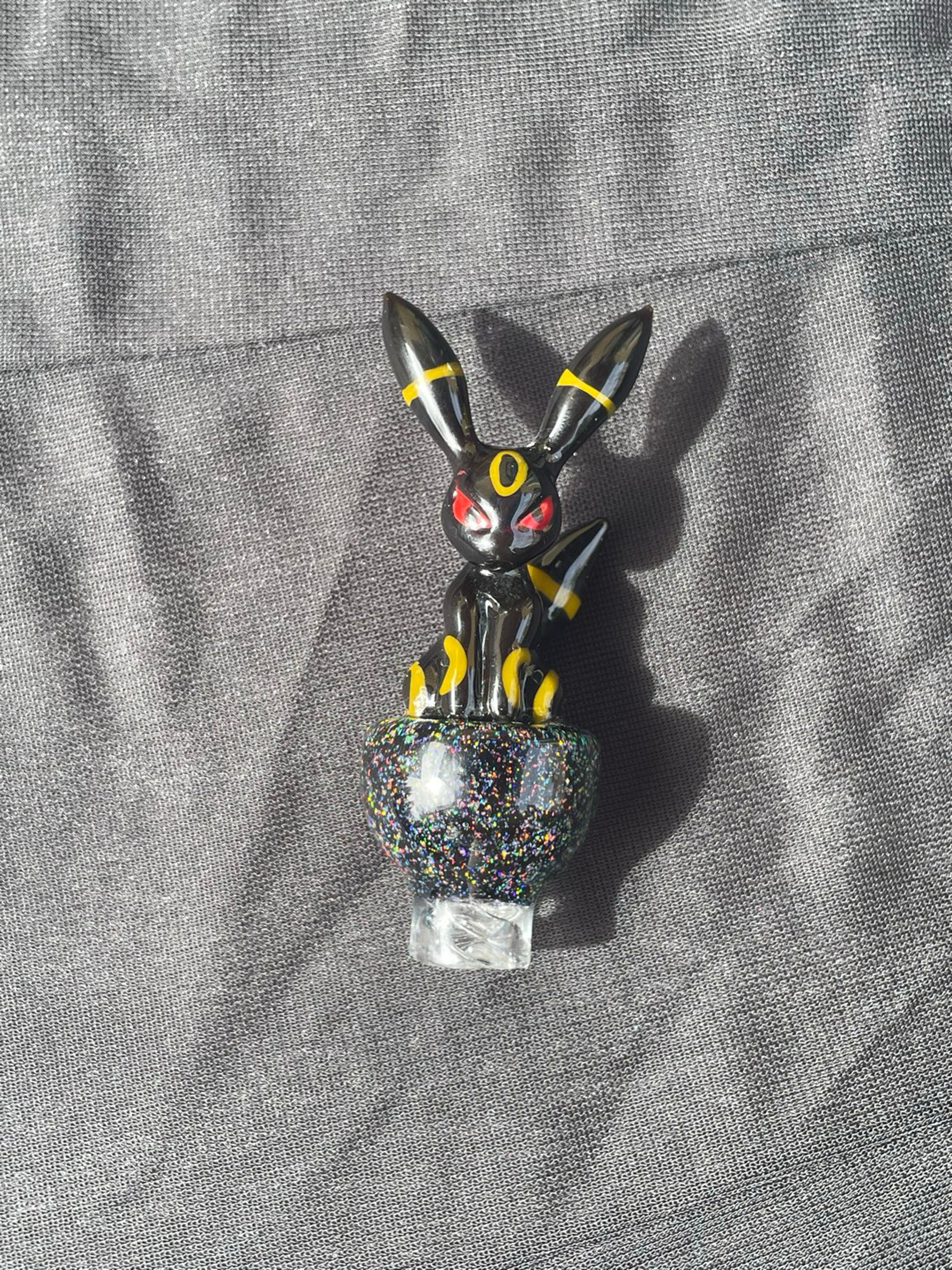 Preview pic of Saiyan Glass Umbreon Spinner Cap
