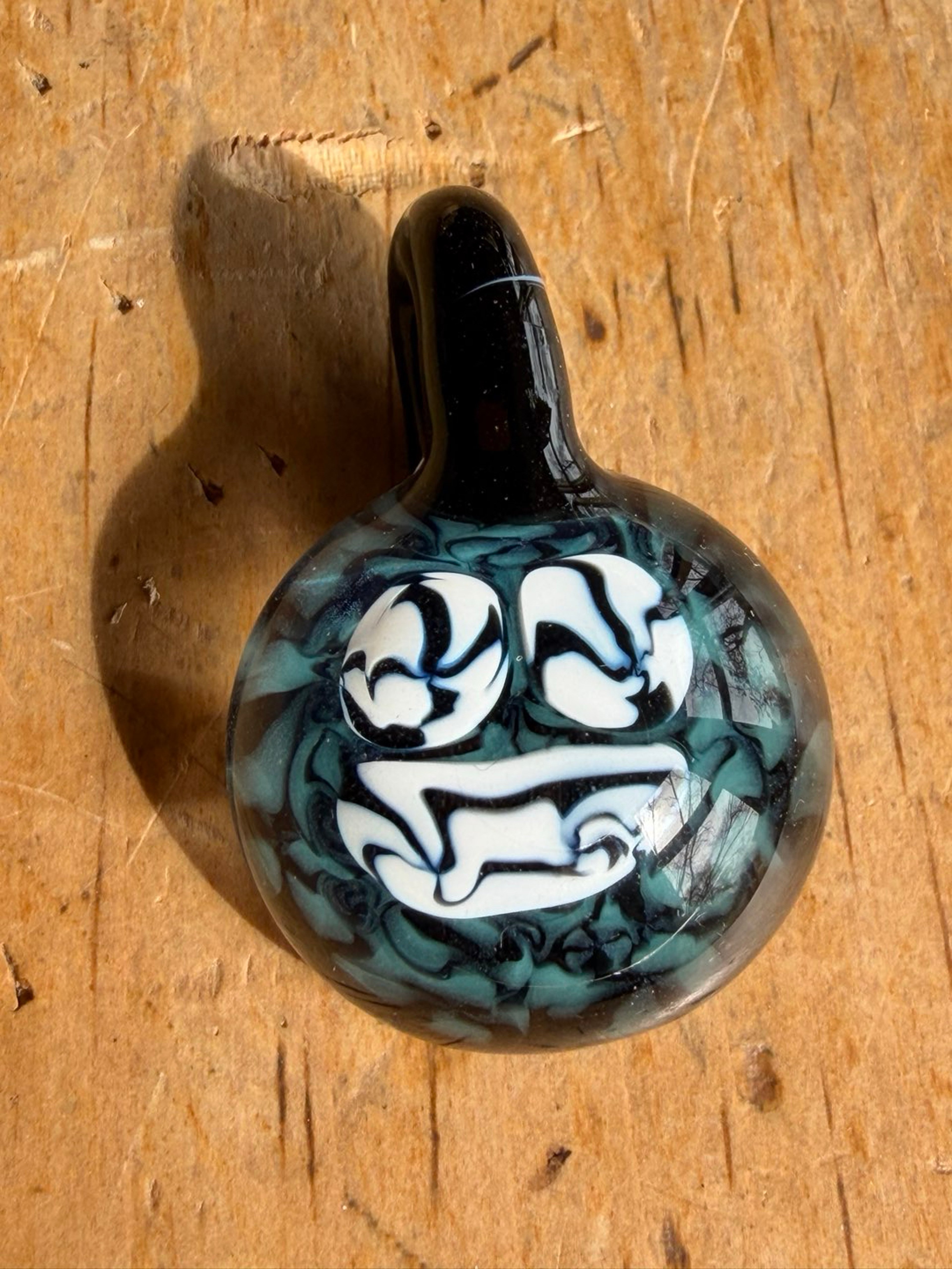 Teal face image 0