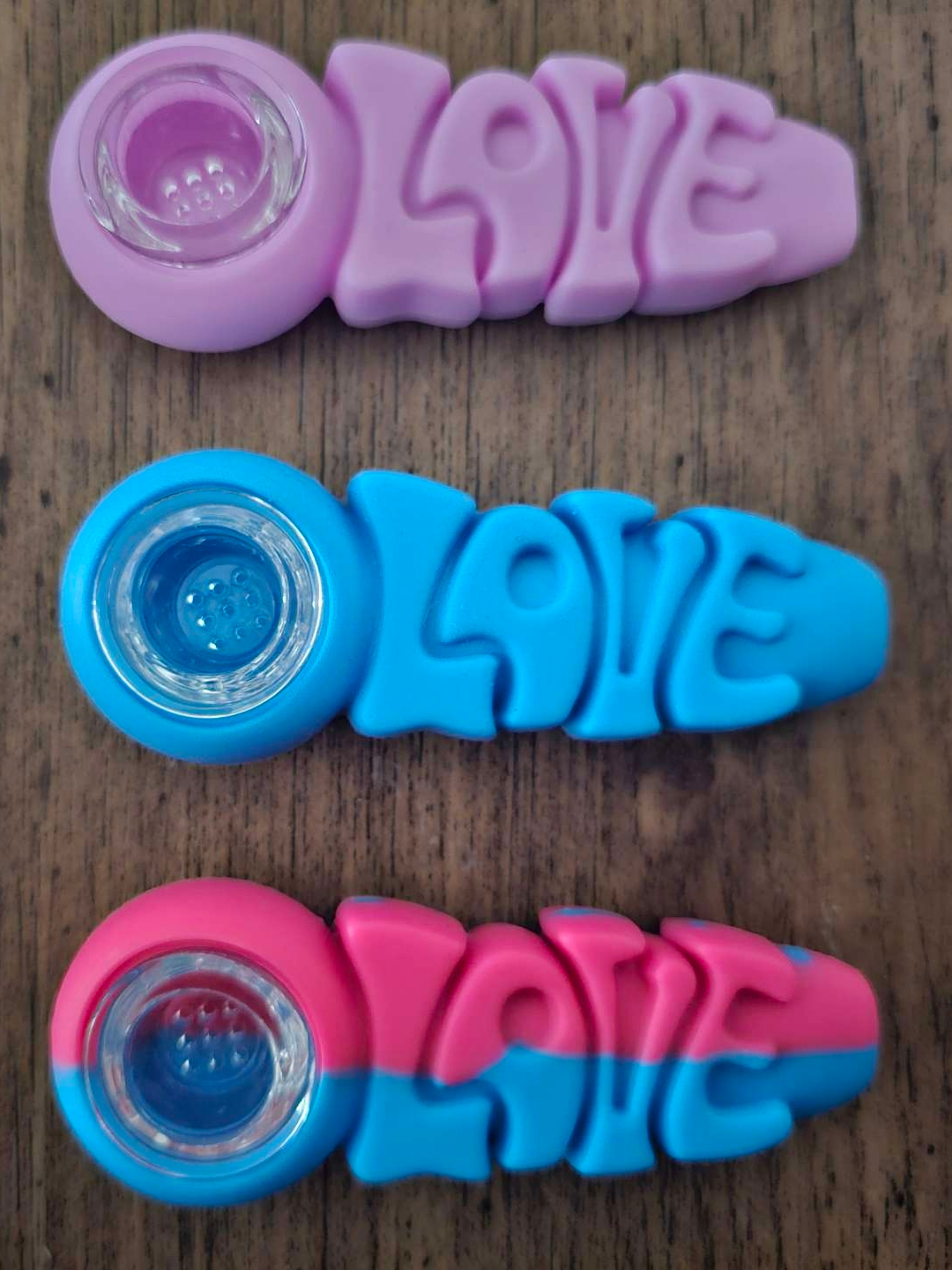 Preview pic of Three Silicone Hand Pipes w/ glass bowls