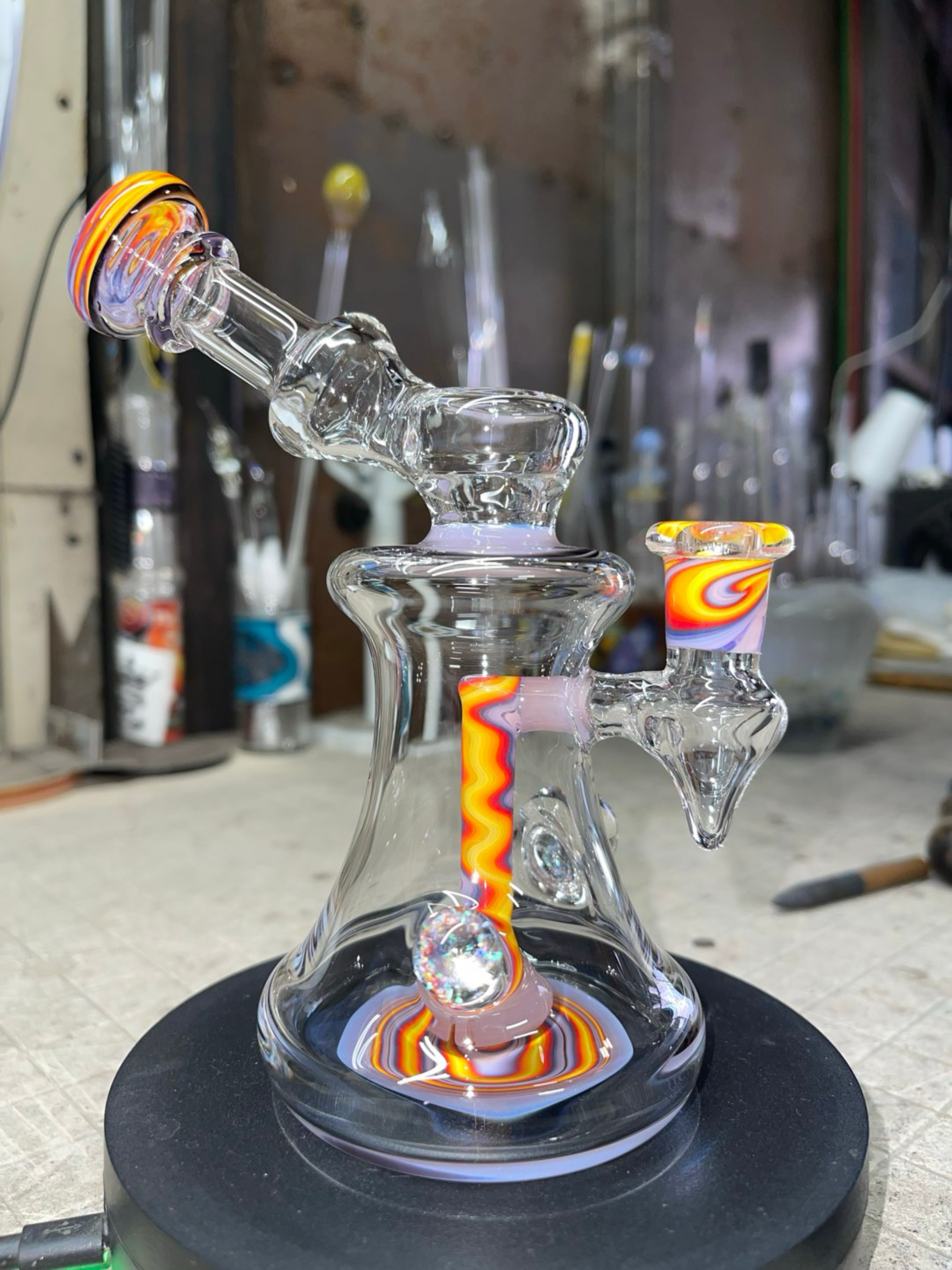 Preview pic of 6.5” tall, 10 mm joint, 6 slits perc, pastel voodoo cfl color accents