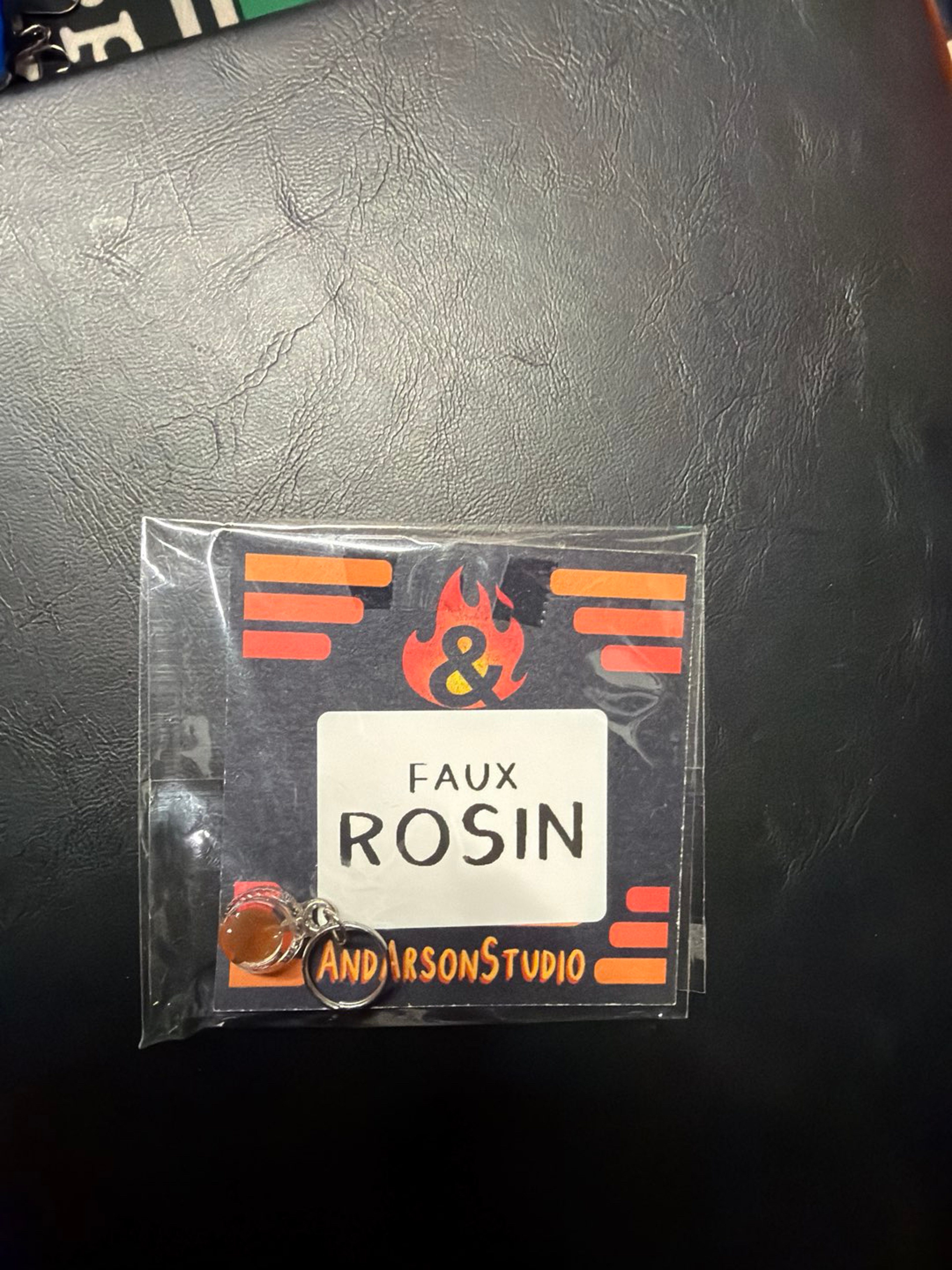 Preview pic of Rosin keychain and 1 black market Quartz flake