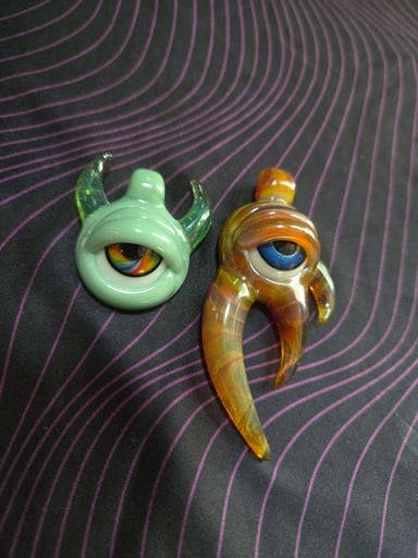 Preview pic of Pair of vision glass  eye pendants