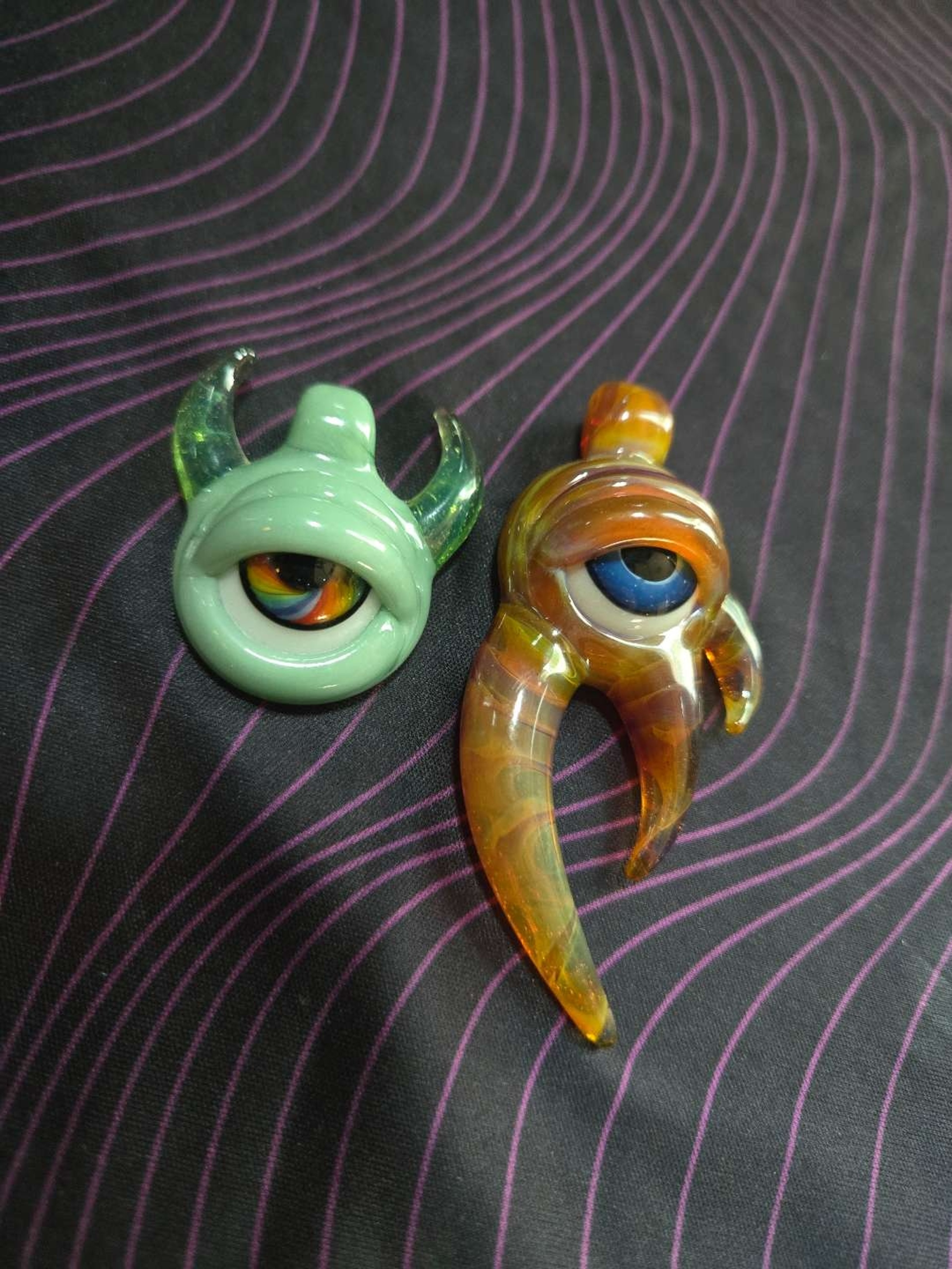 Preview pic of Pair of vision glass  eye pendants