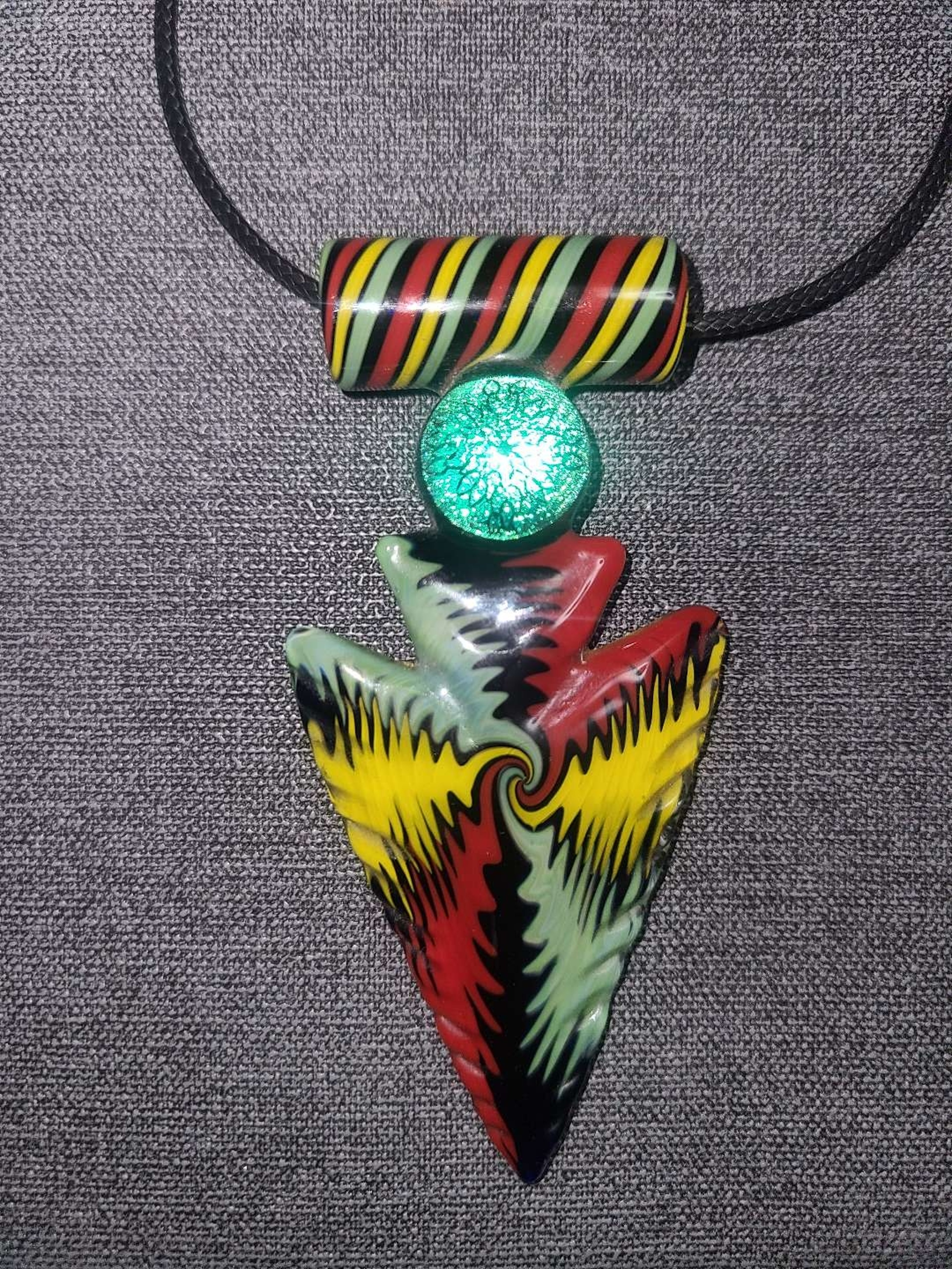 8mm Glass Rasta Arrowhead image 0