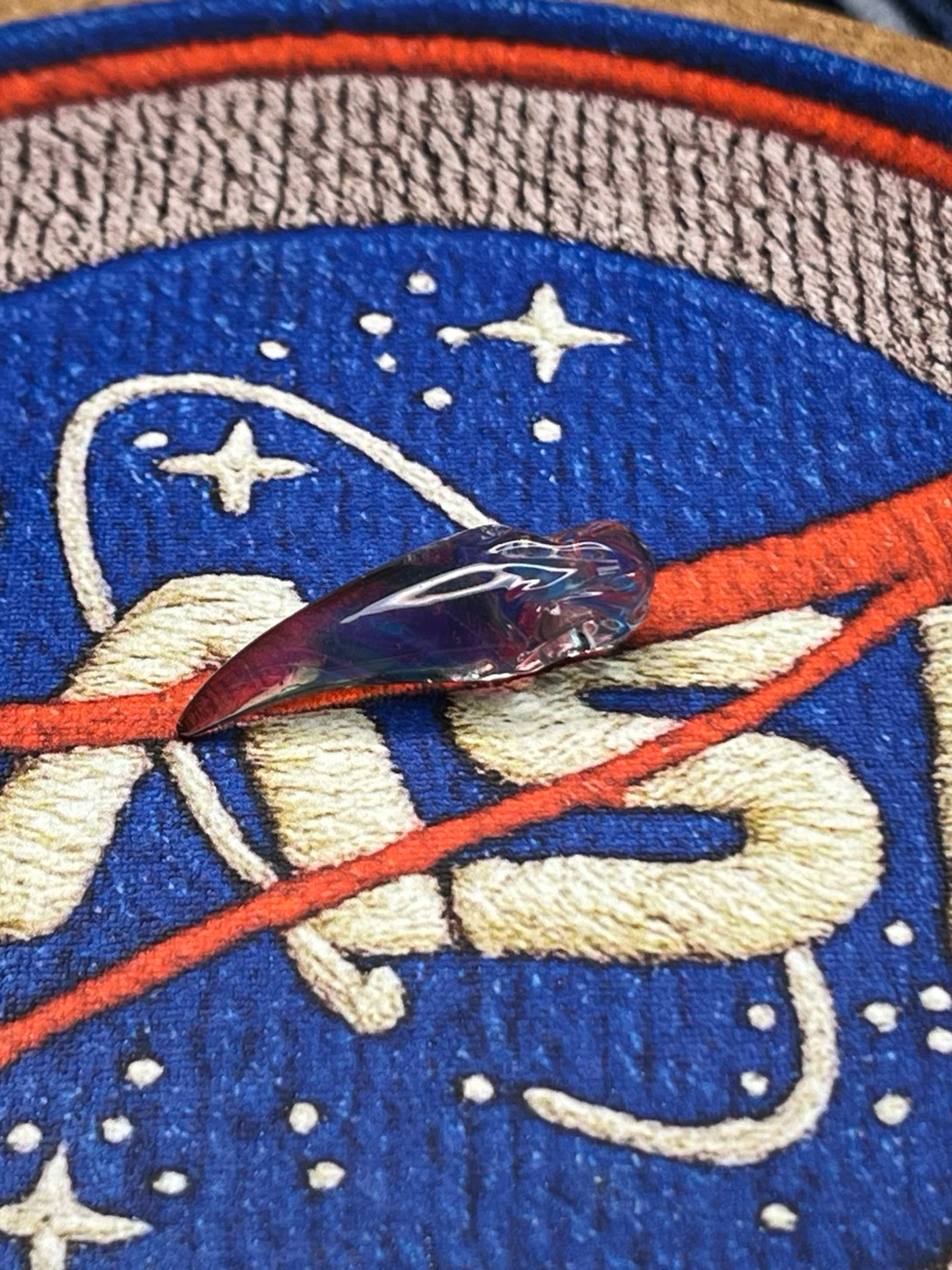 Hemlock glass sculpted fang pendant image 0