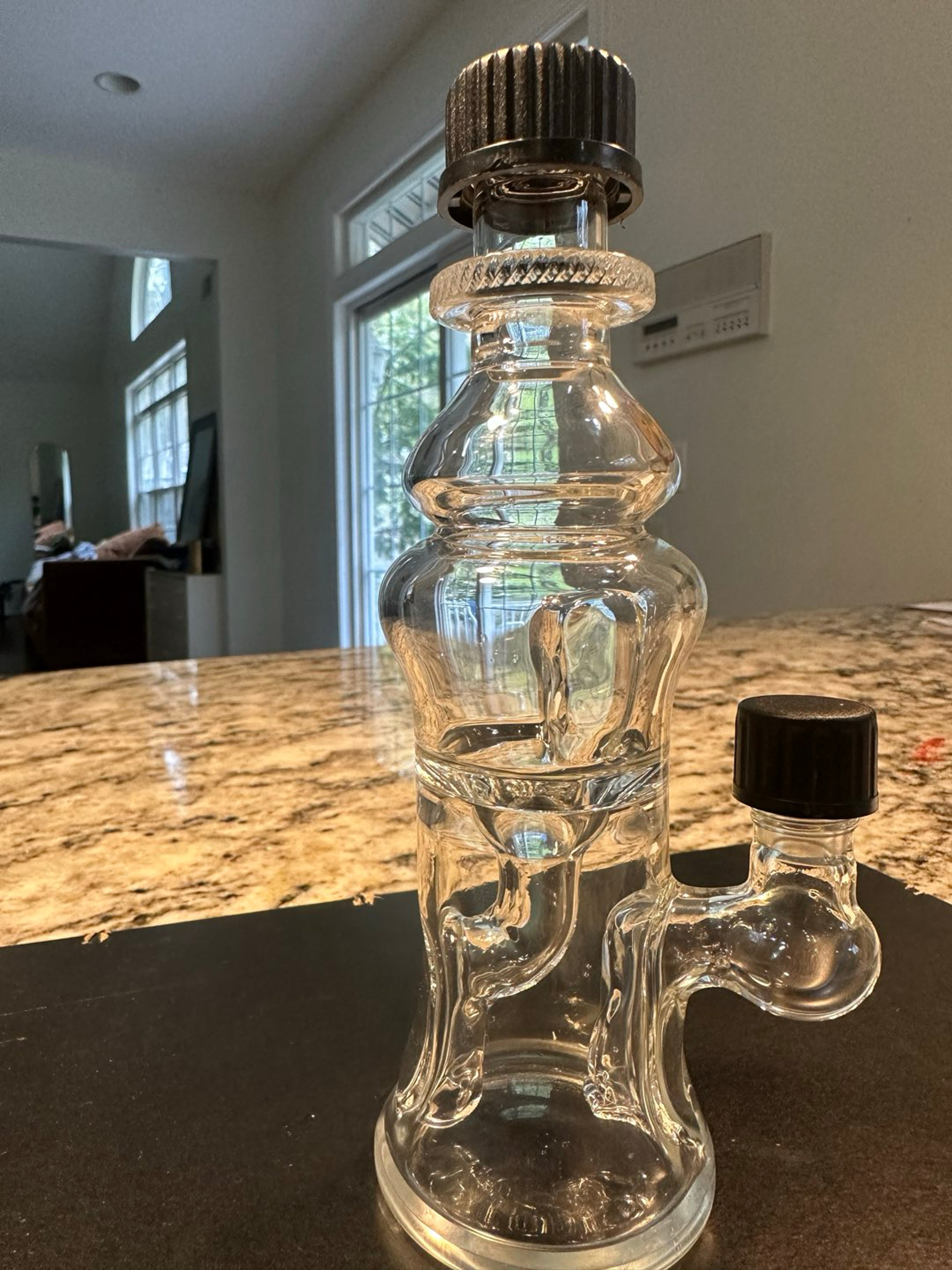 Preview pic of Moocah bottle recycler rig with twist caps!