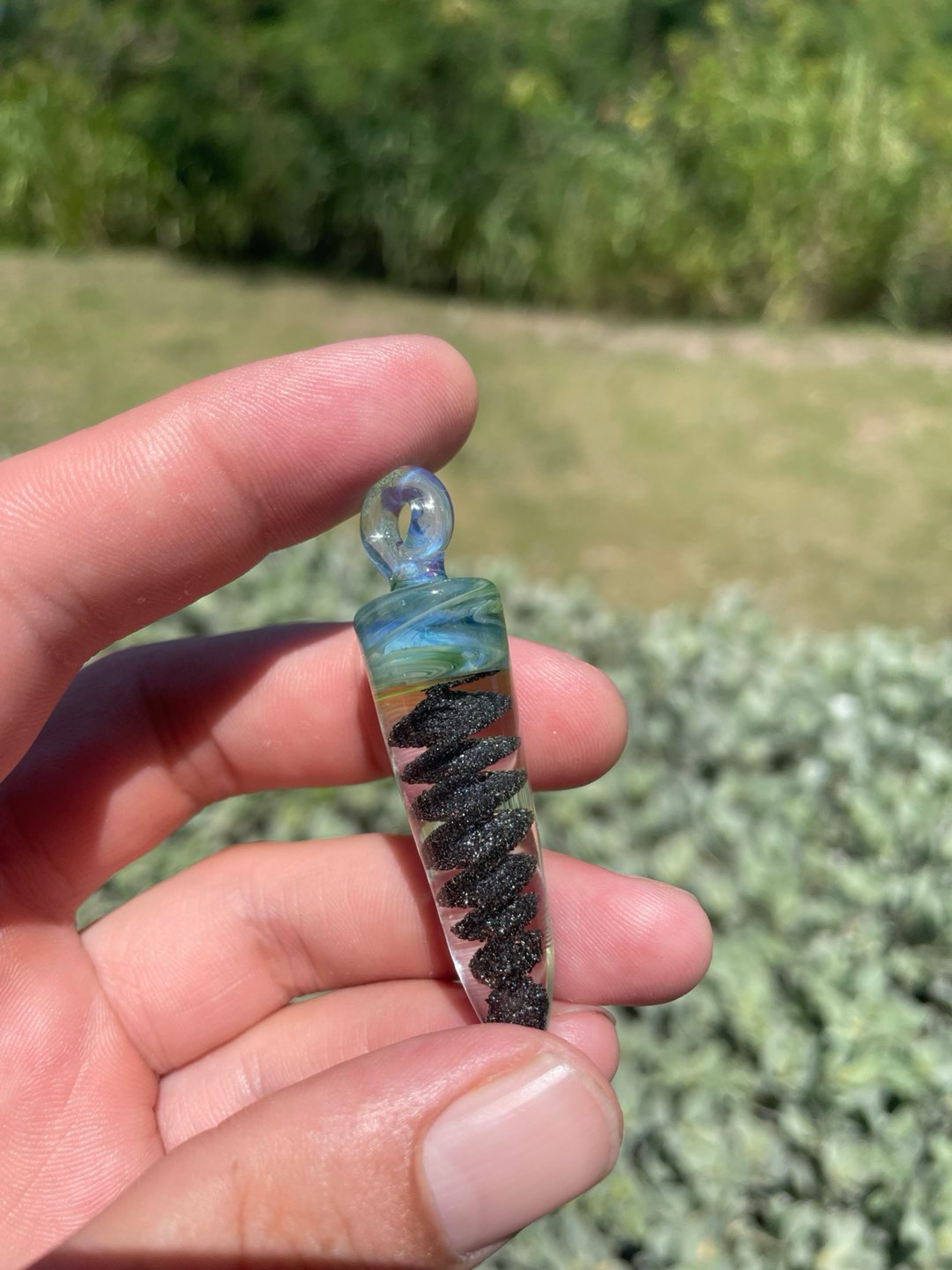 Preview pic of Encased black sand energy spiral