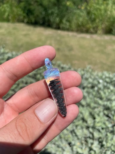Preview pic of Encased black sandy energy spiral