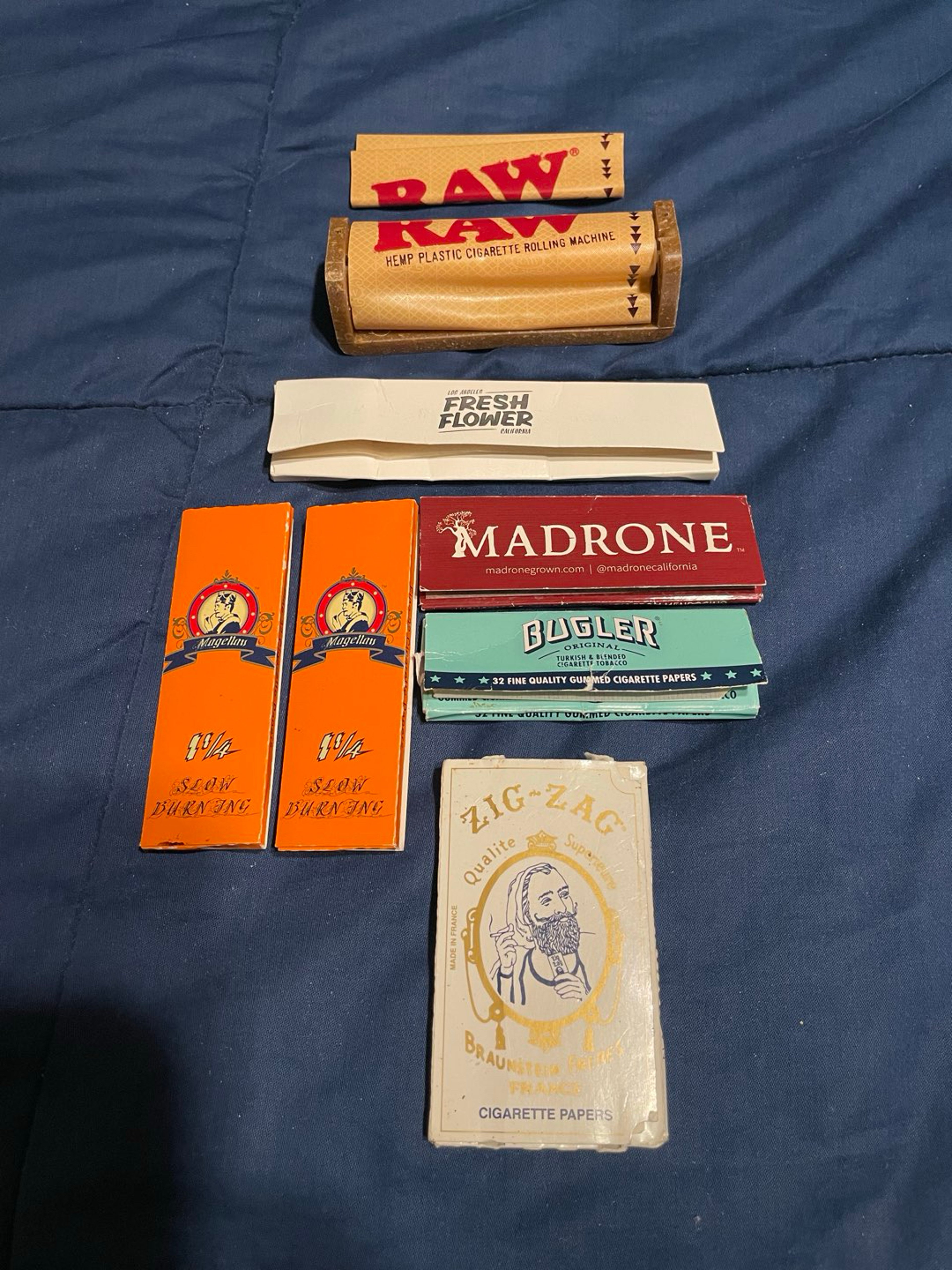 Preview pic of A RAW brand cigarette rolling machine with papers