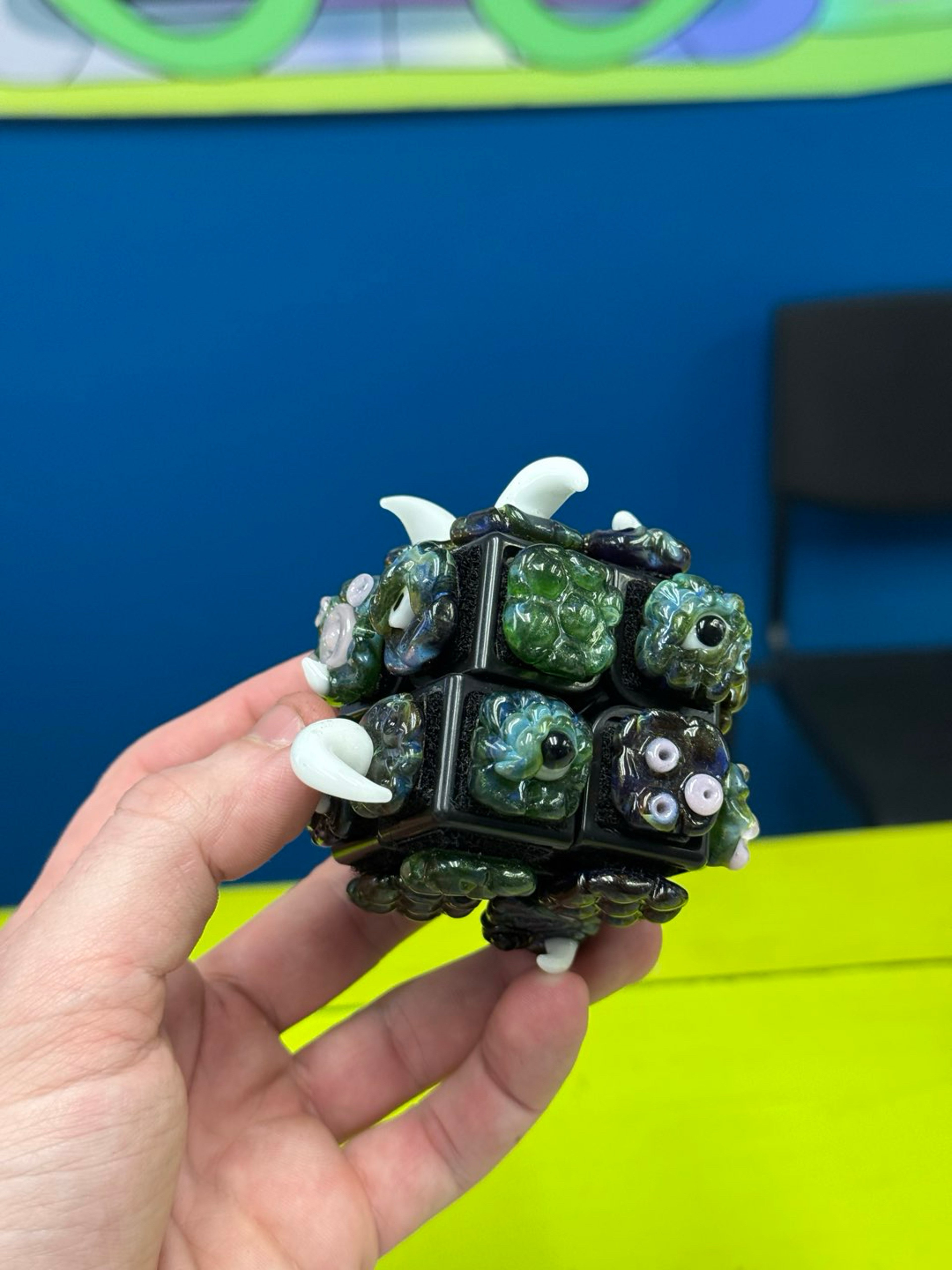 Preview pic of Phyrexian Puzzle Cube (sculpted glass functional rubiks core)