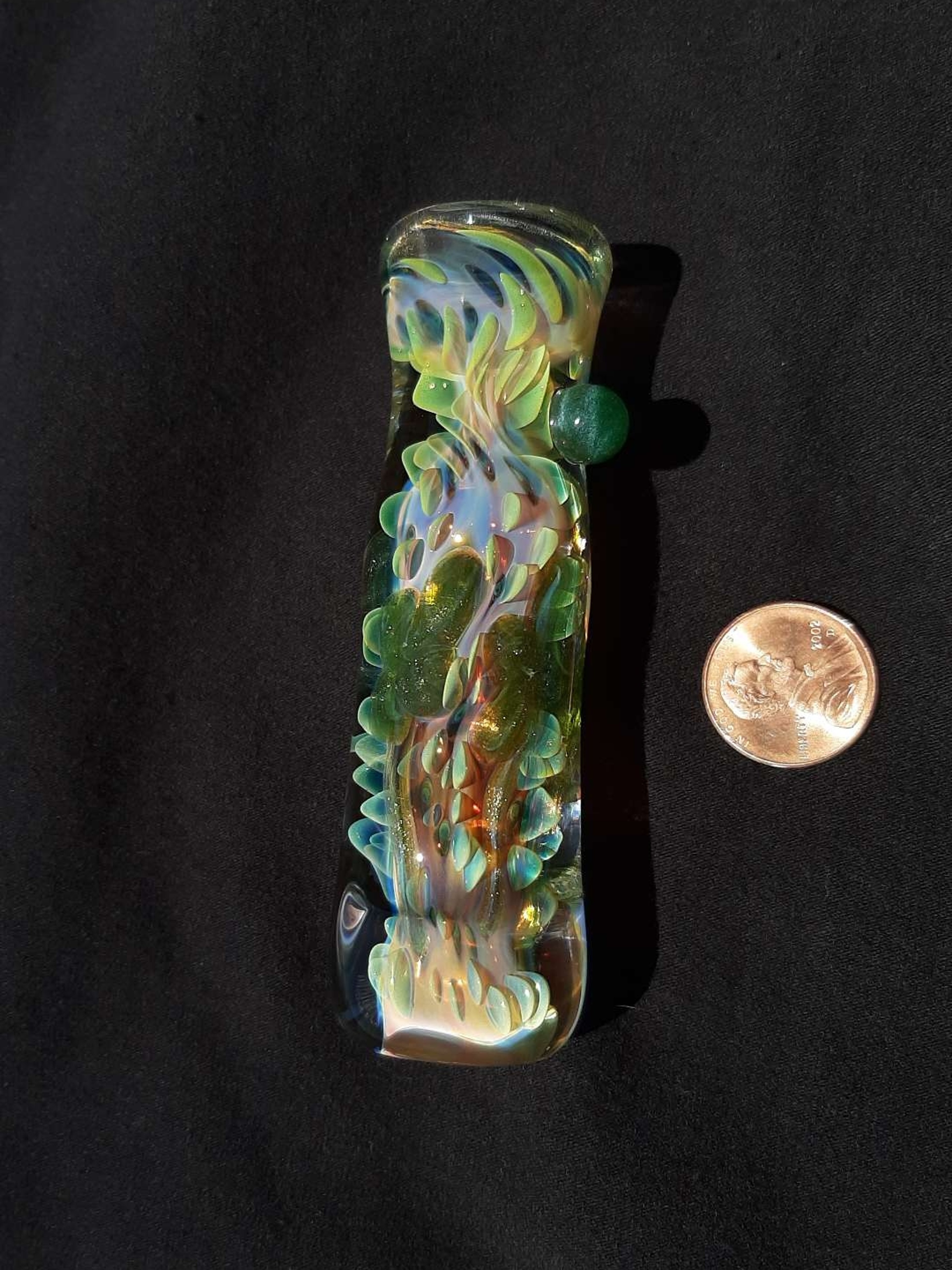 Preview pic of 4 leaf clover, inside out, color changing, borosilicate glass chillum with a flattened mouth