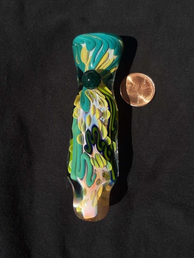 Preview pic of Inside out, color changing, borosilicate glass chillum with a flattened mouth