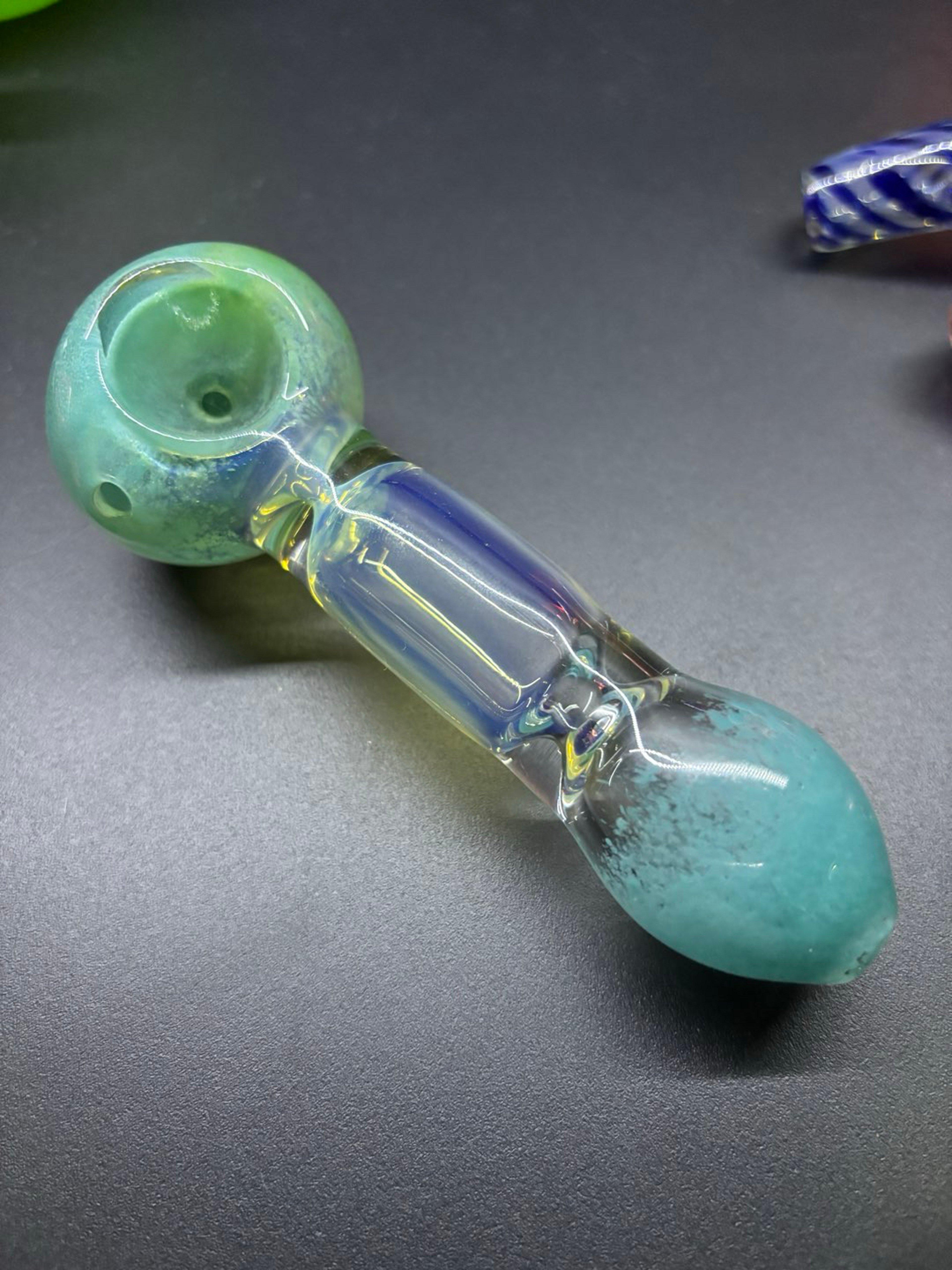Preview pic of Aqua color changing see-thru chamber spoon