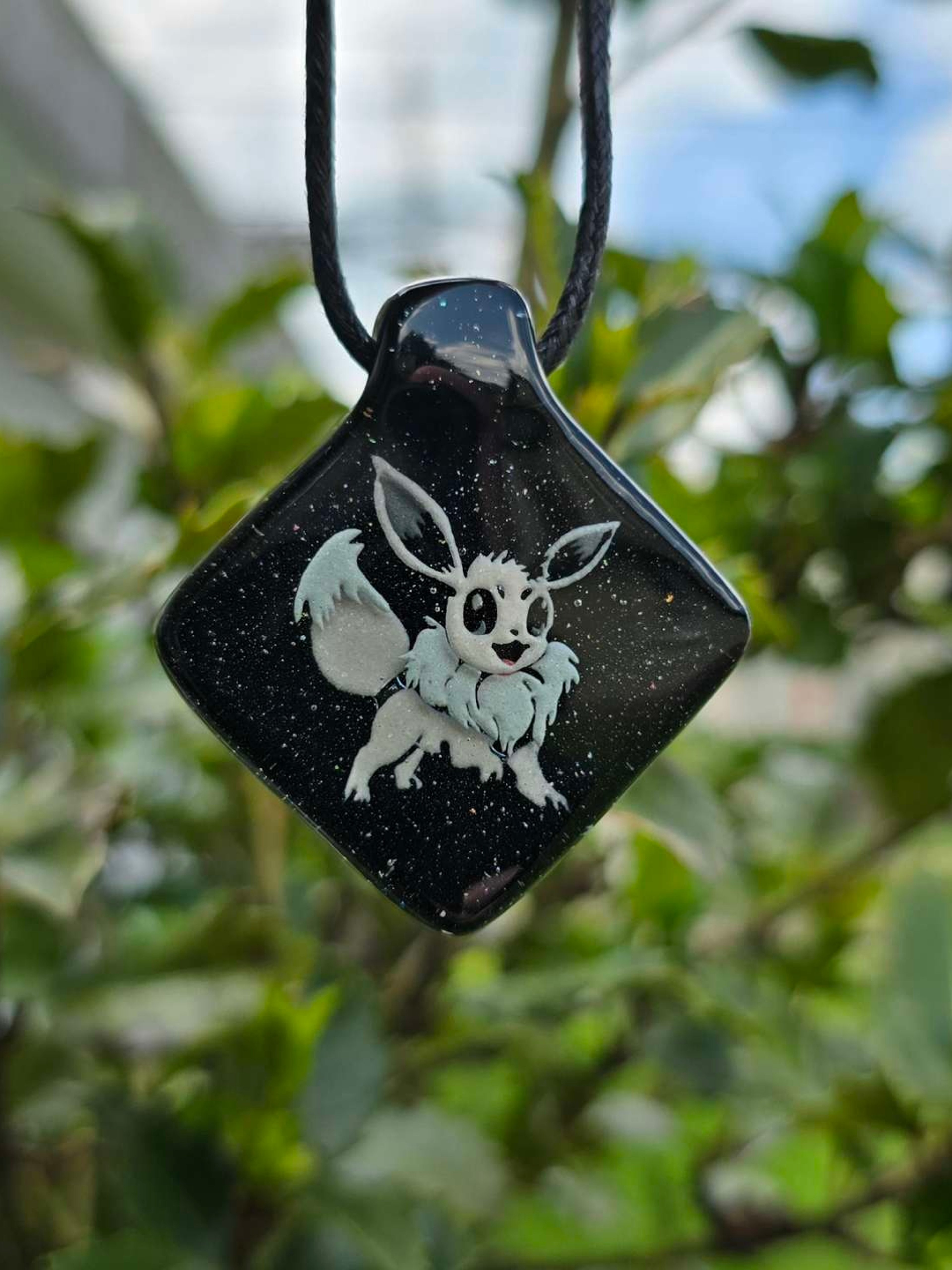 Preview pic of Shiny Eevee Layered Glow UV Pendant