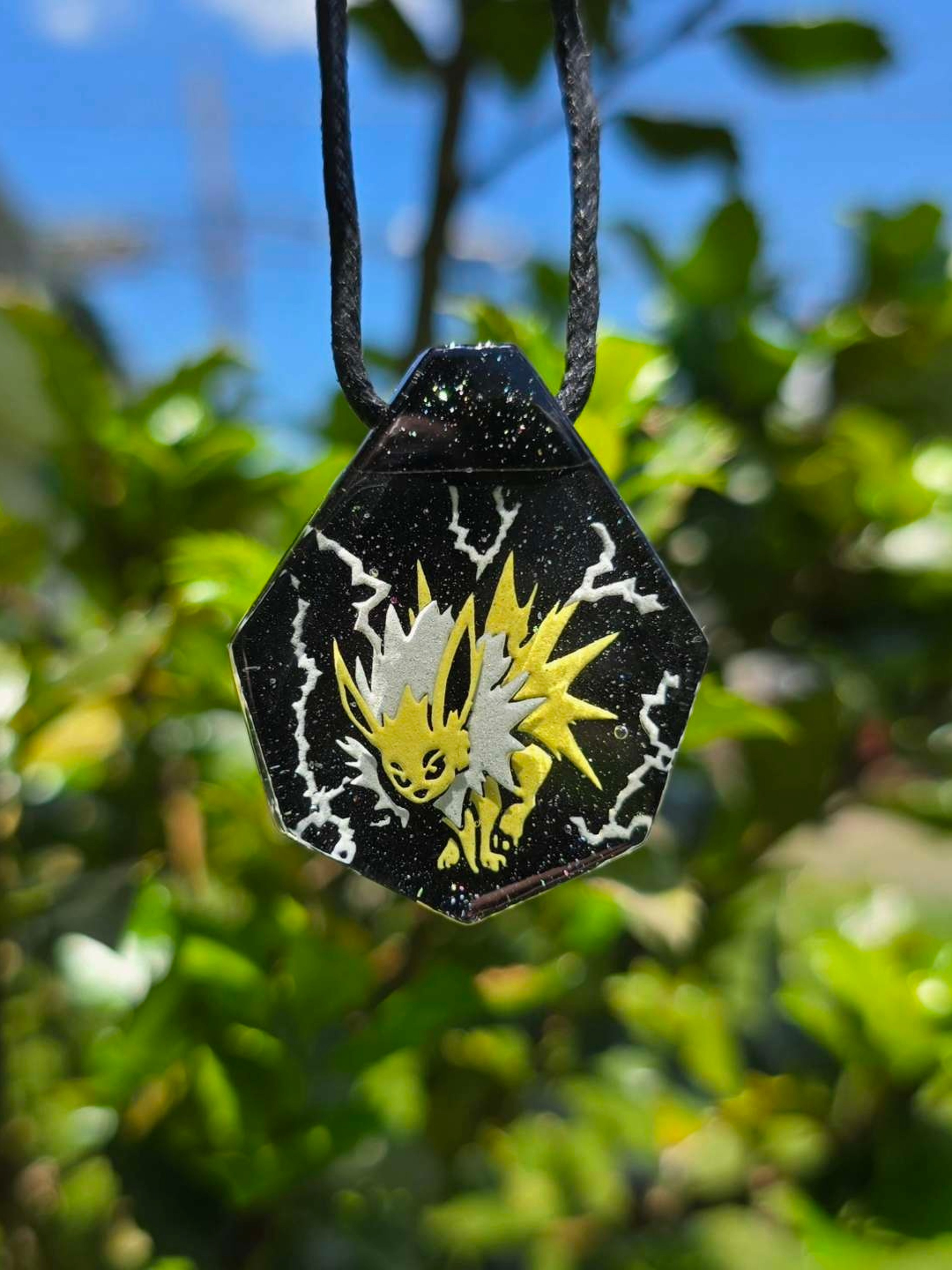 Preview pic of Jolteon Layered Glow Pendant
