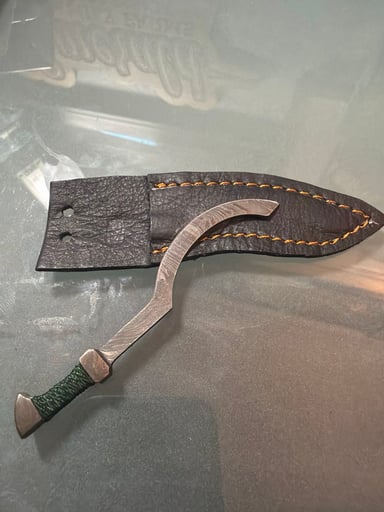 Preview pic of Stainless steel Damascus khopesh pick