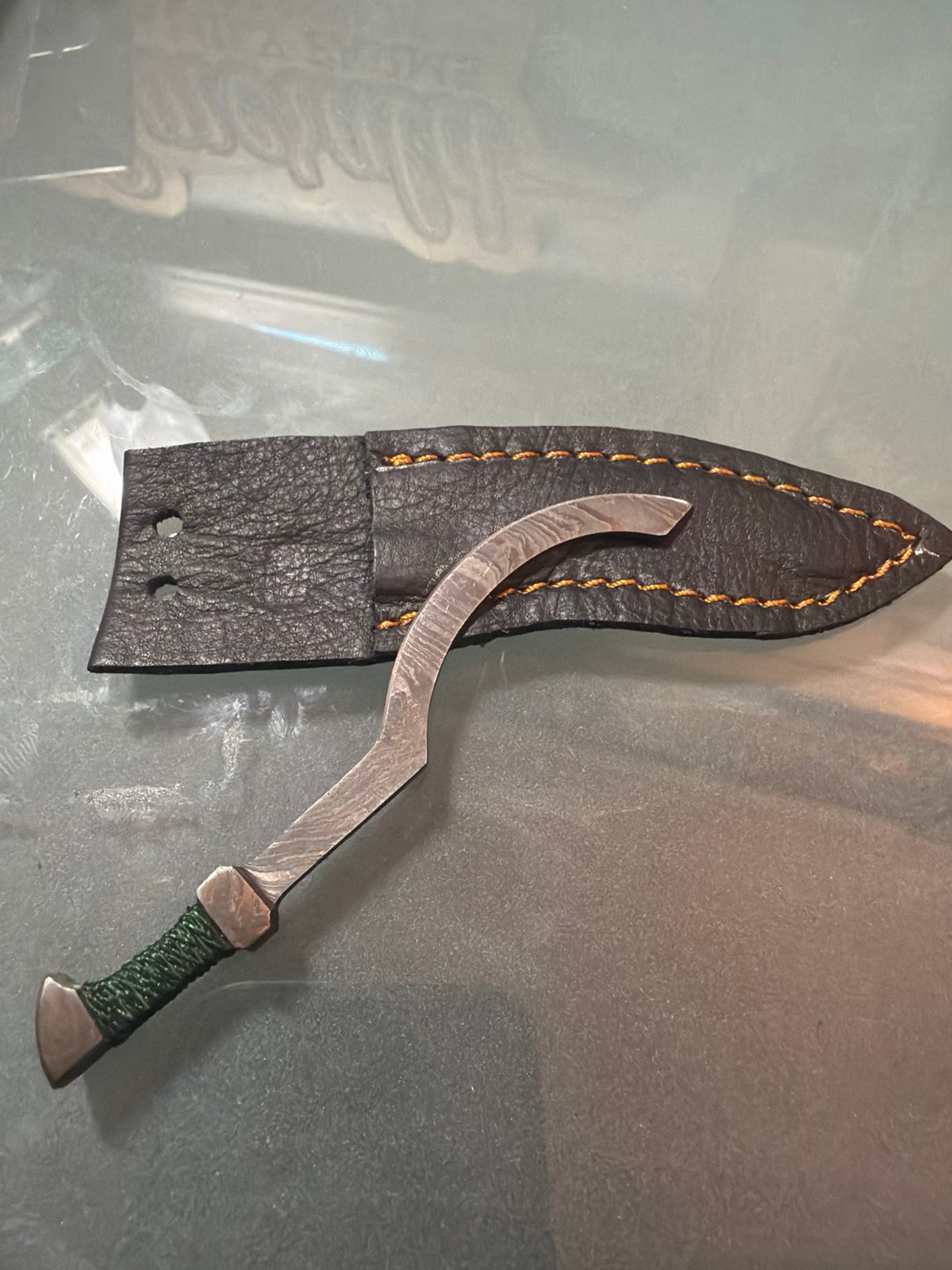 Preview pic of Stainless steel Damascus khopesh pick
