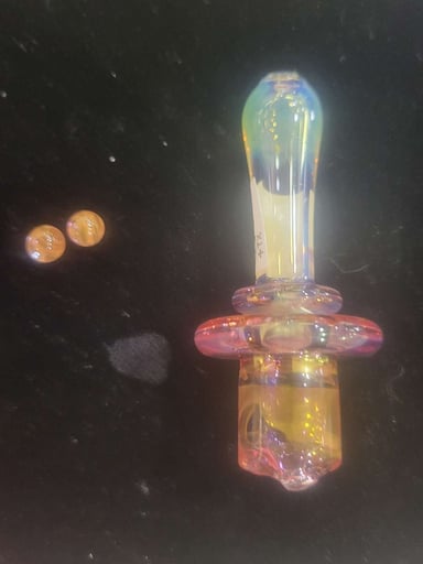 Preview pic of Yeti Glass carb cap with terp pearls