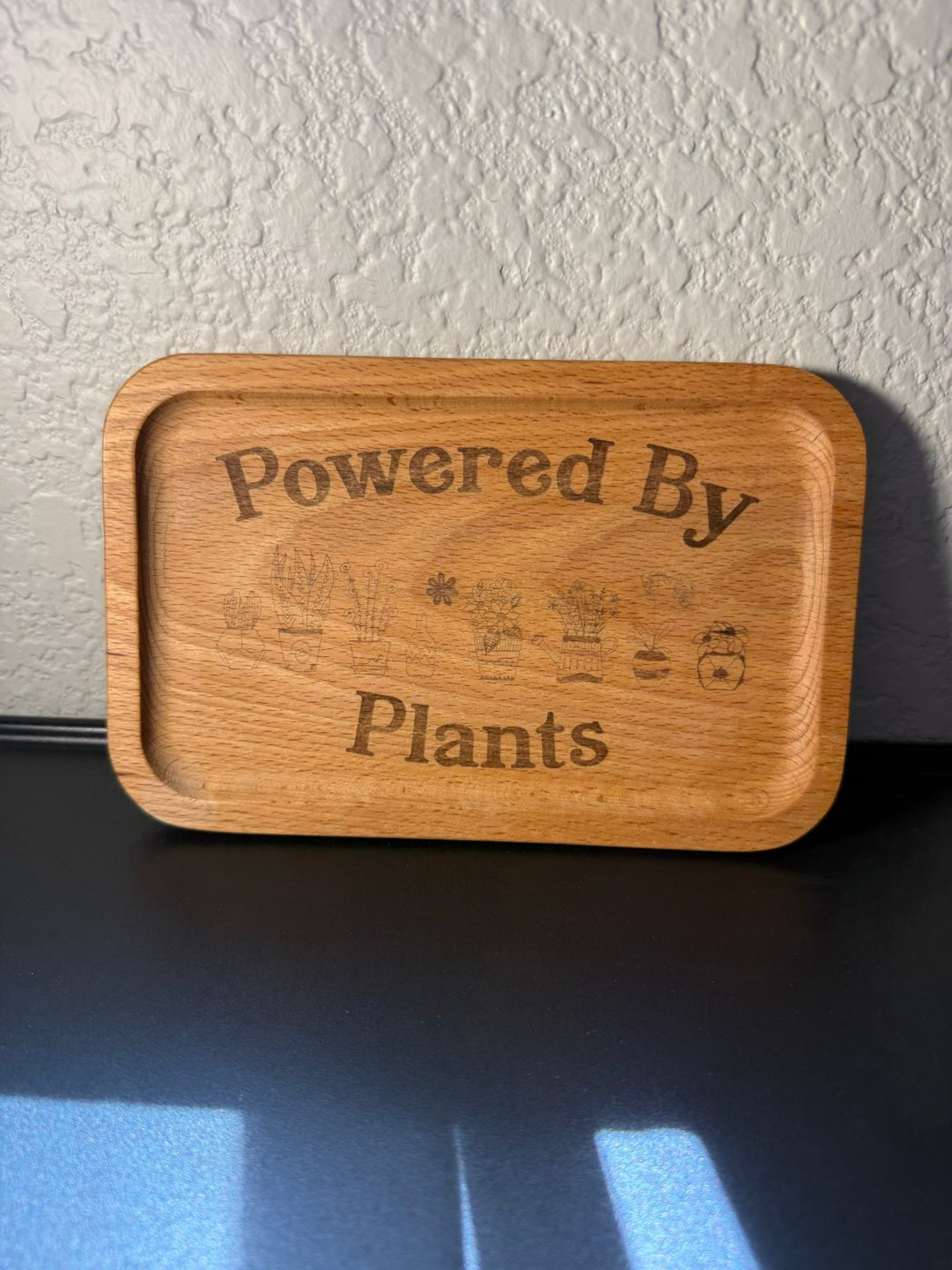 Preview pic of “powered by plants” etched natural wood rolling tray