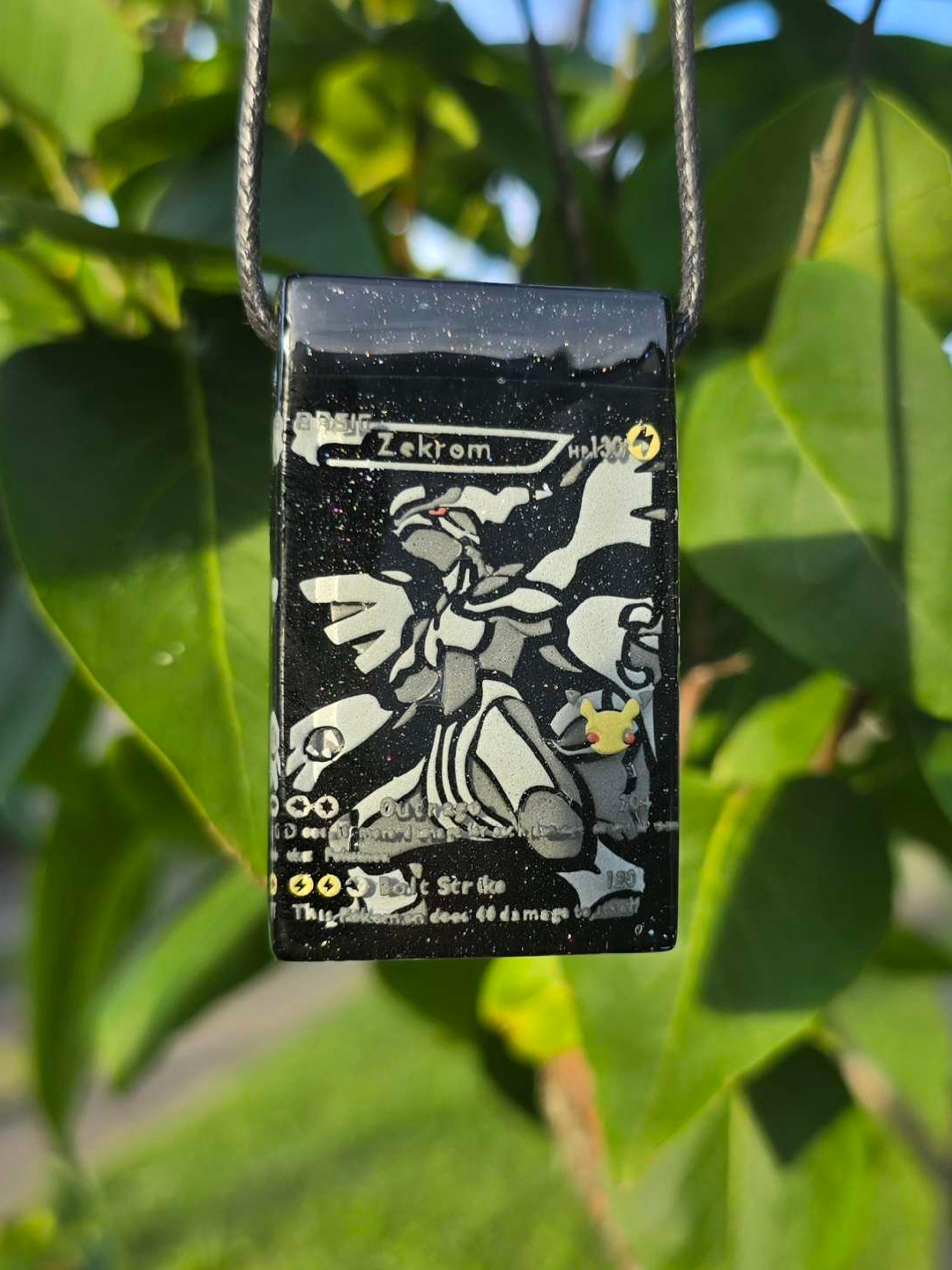 Preview pic of Zekrom Glass Pokemon Card Glow Pendant